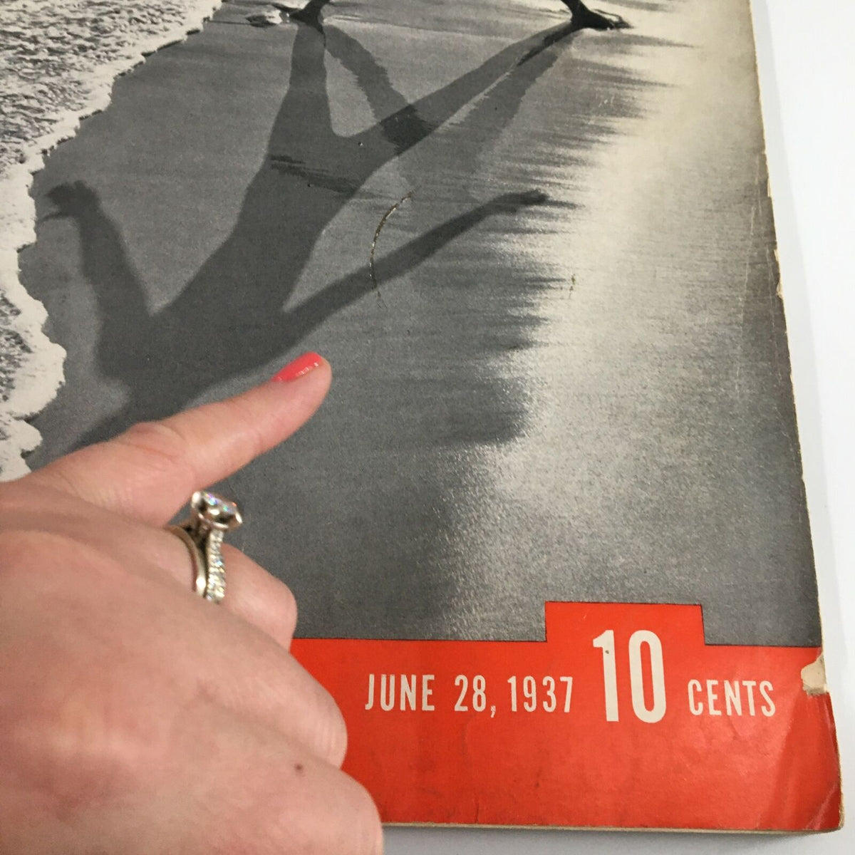 Close-up detail of VTG Life Magazine June 28 1937 cover showing the date and slight wear, highlighting the magazine's vintage character.