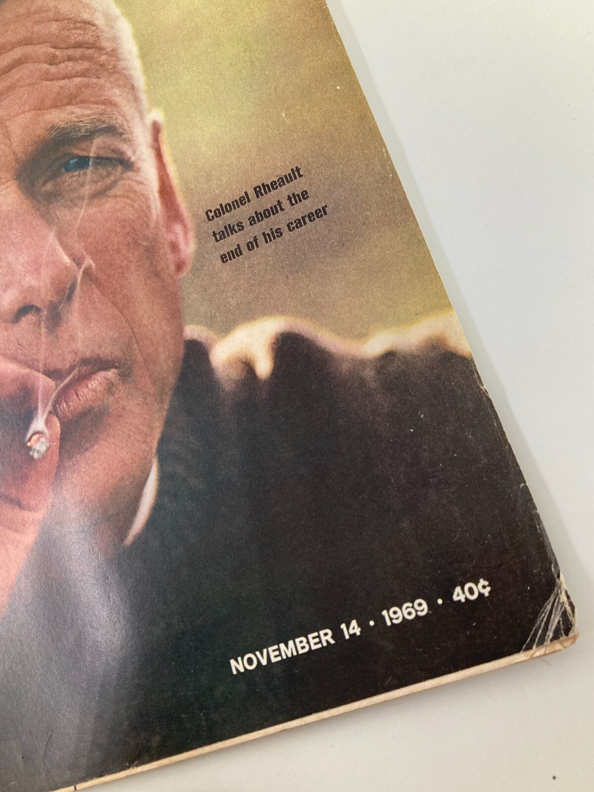 Close-up of the vintage Life Magazine cover from November 14, 1969 showing Colonel Rheault and text about his career end. The image highlights the date and pricing of the magazine.