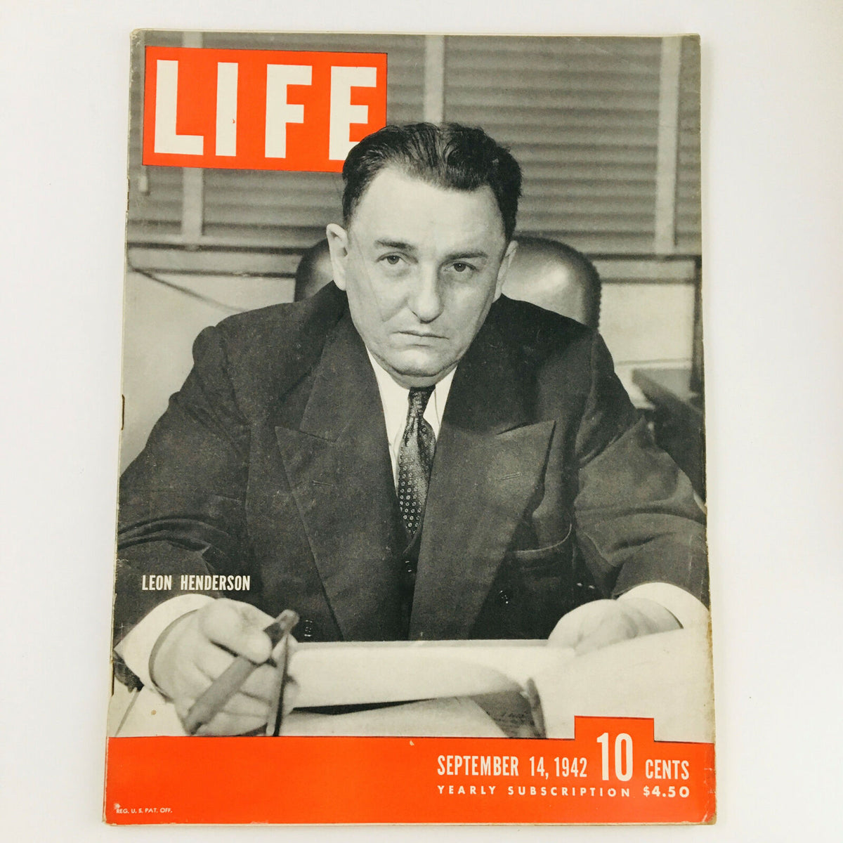 VTG Life Magazine September 14 1942 featuring a photograph of Leon Henderson in a suit sitting at a desk.