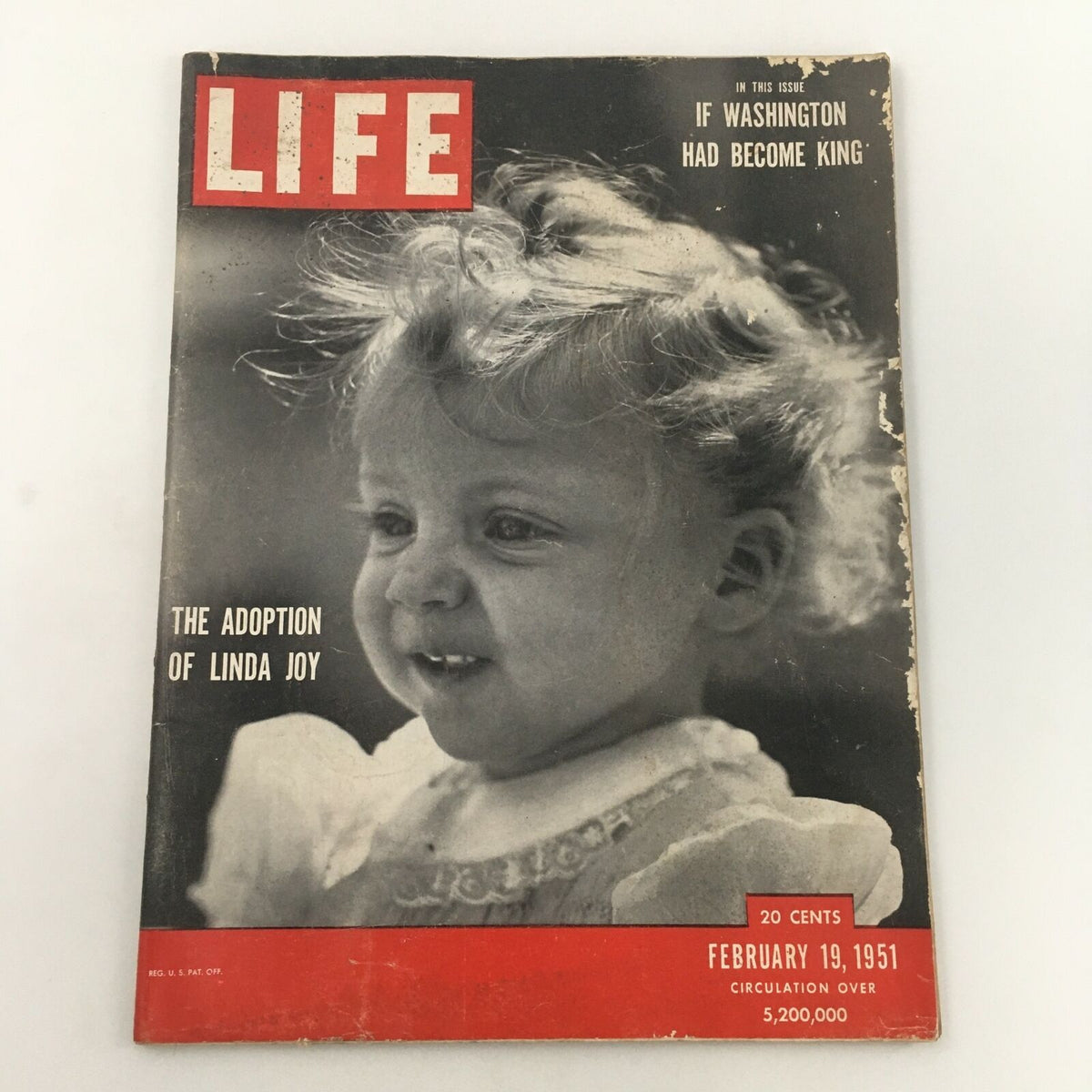 Vintage Life Magazine cover from February 19, 1951, featuring 'The Adoption of Linda Joy'. The cover shows a smiling child with curly hair, emphasizing the emotional theme of adoption. This iconic magazine issue is a collector's item that captures mid-20th century American culture.