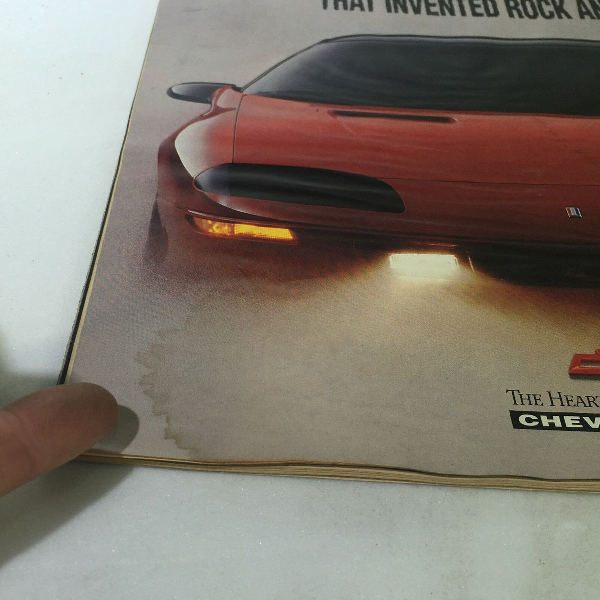 Detail of the VTG Life Magazine December 1, 1992, showcasing a red Chevy Camaro advertisement, emphasizing its association with rock and roll.
