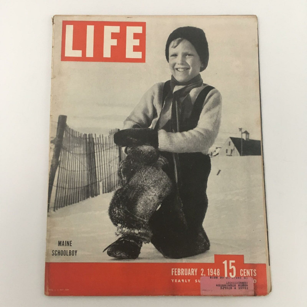 Vintage Life Magazine cover from February 2, 1948, featuring Maine schoolboy Bobby Lofman. The cover showcases a black-and-white photograph of a smiling boy in winter attire, set against a snowy background, highlighting the iconic red Life Magazine logo.
