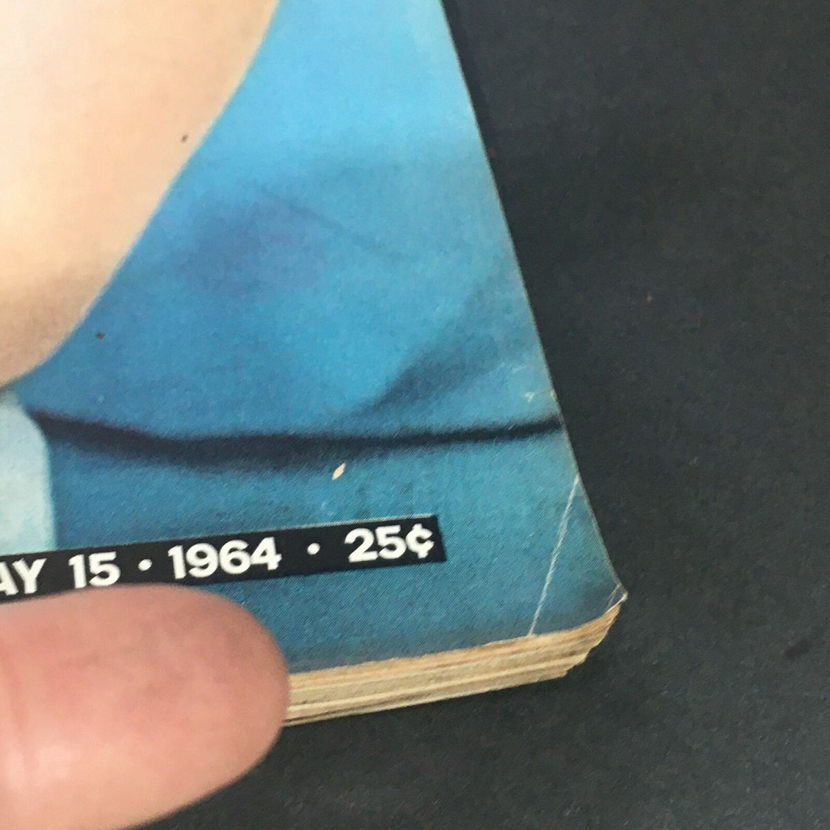 Close-up view of the corner of VTG Life Magazine May 15 1964 featuring the date and price, highlighting the historical context of Luci Baines Johnson's teenage years in the White House.