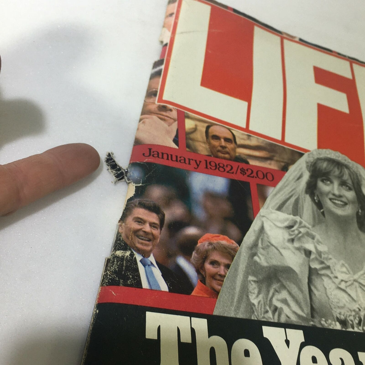 Close-up of the damaged corner of VTG Life Magazine January 1982 highlighting Prince Charles and Princess Diana's wedding cover.