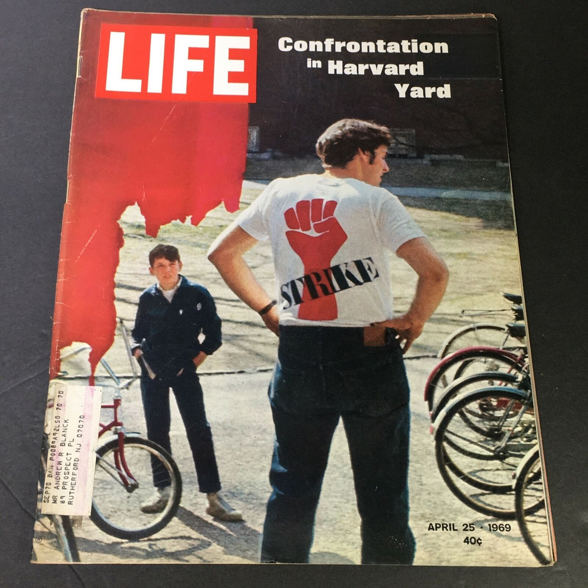 VTG Life Magazine April 25 1969 cover featuring the headline 'Confrontation in Harvard Yard' with a visual of a protester wearing a 'STRIKE' shirt and another person in the background.