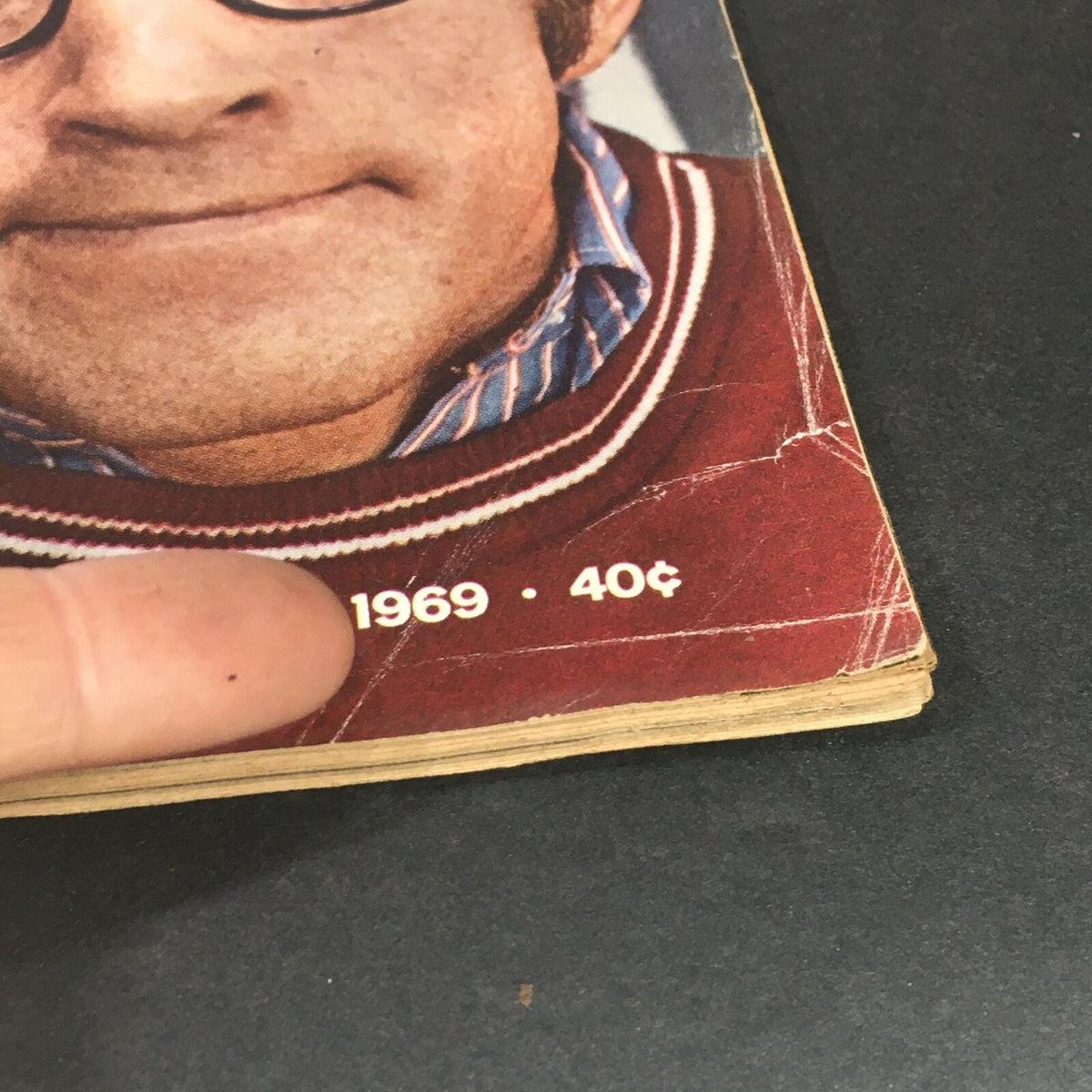 Close-up of the corner of the VTG Life Magazine from March 21, 1969, highlighting the publication date and price, with visible wear and creases.