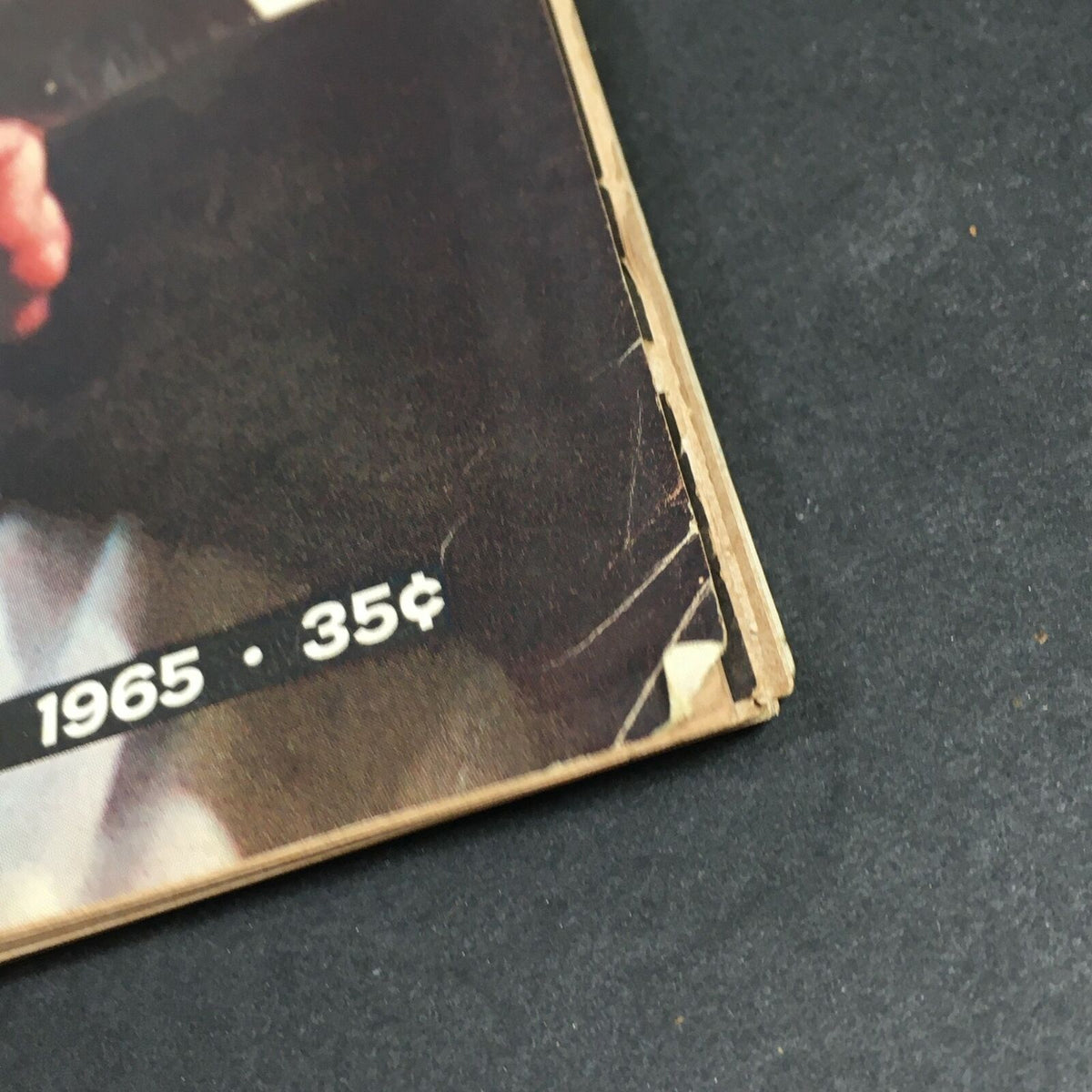 Corner detail of the VTG Life Magazine from November 12, 1965, showing edge wear, with the date and price highlighted.