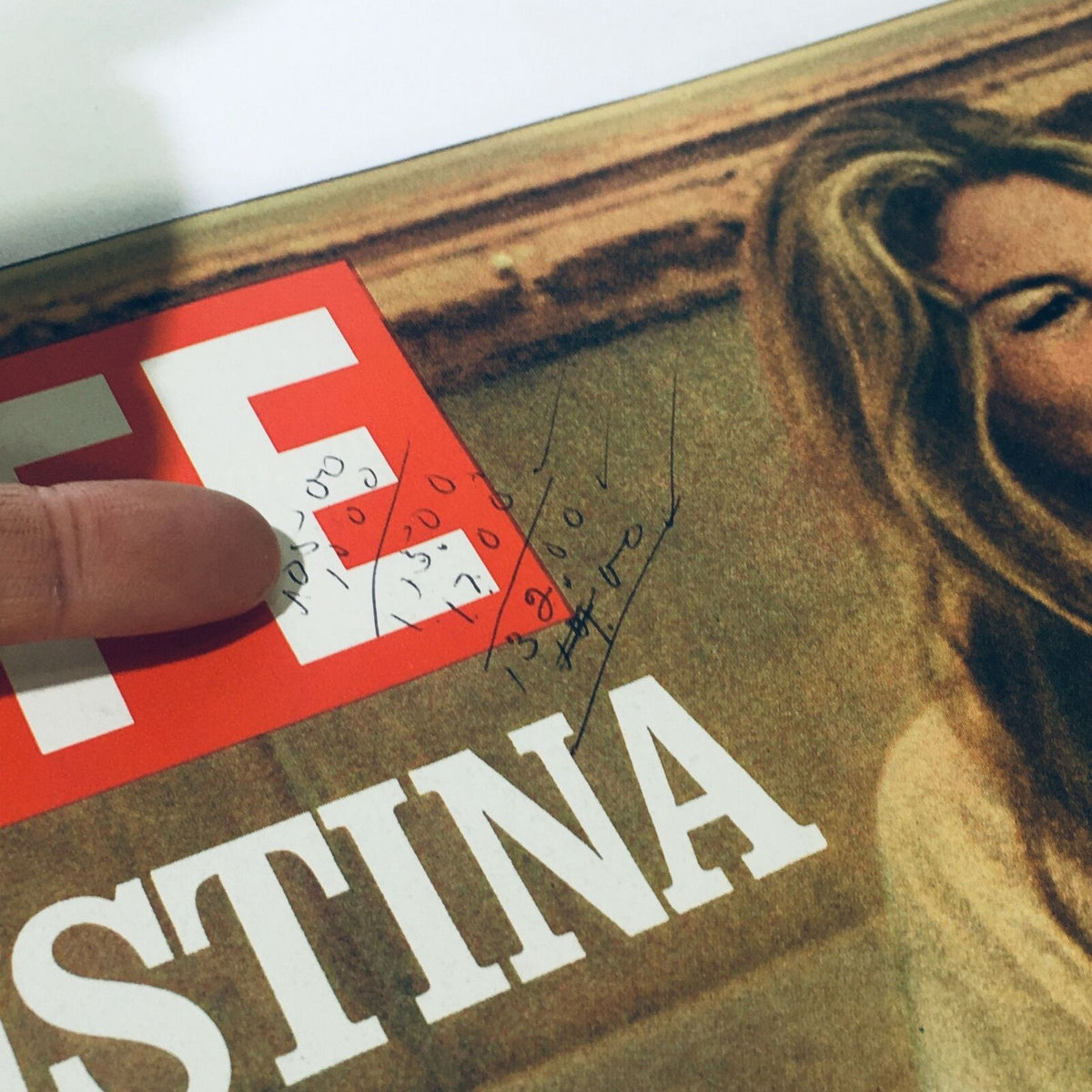 Close-up of the cover of VTG Life Magazine June 4 1971, showing handwritten notes and pricing near the iconic title featuring Cristina Ford.