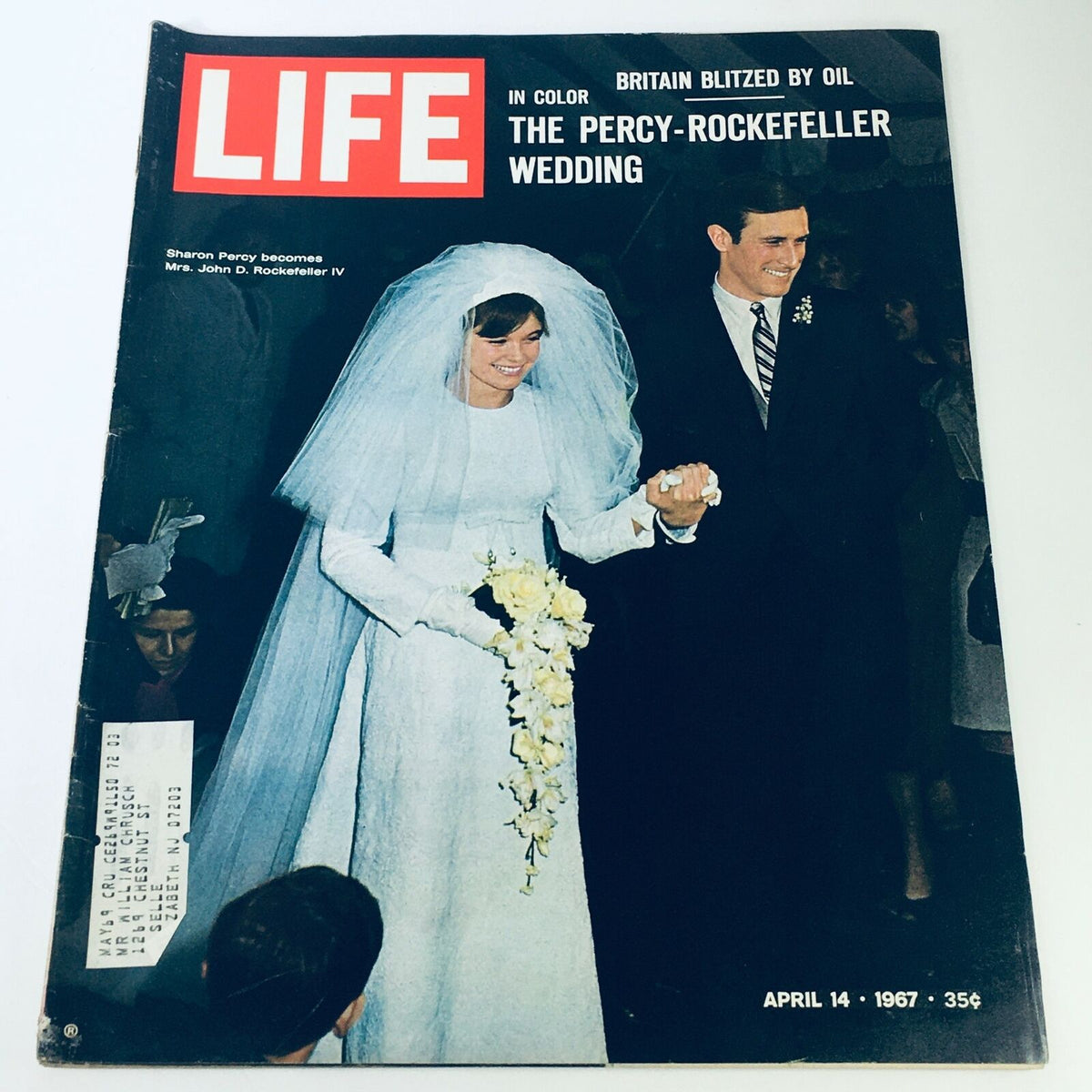 Vintage Life Magazine cover from April 14, 1967, featuring the wedding of Sharon Percy and John Rockefeller. The cover shows Sharon Percy in a beautiful wedding gown and veil, holding a bouquet of flowers, alongside John Rockefeller IV, dressed in a suit. The title 'LIFE' is prominently displayed, marking this iconic moment in history.