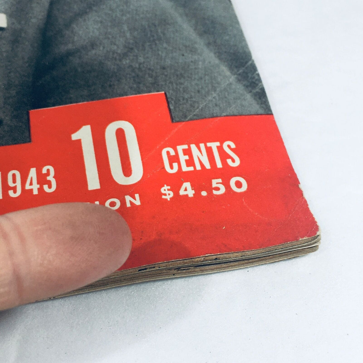 Close-up of the price section on the vintage Life Magazine from March 22, 1943, showing the cost of 10 cents and the magazine title 'Victor of Bismarck Sea by Henry R. Luce'.