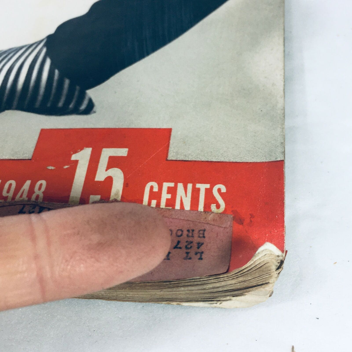 Close-up of the price tag from the VTG Life Magazine January 12 1948, showing the price of 15 cents and minor wear on the cover.