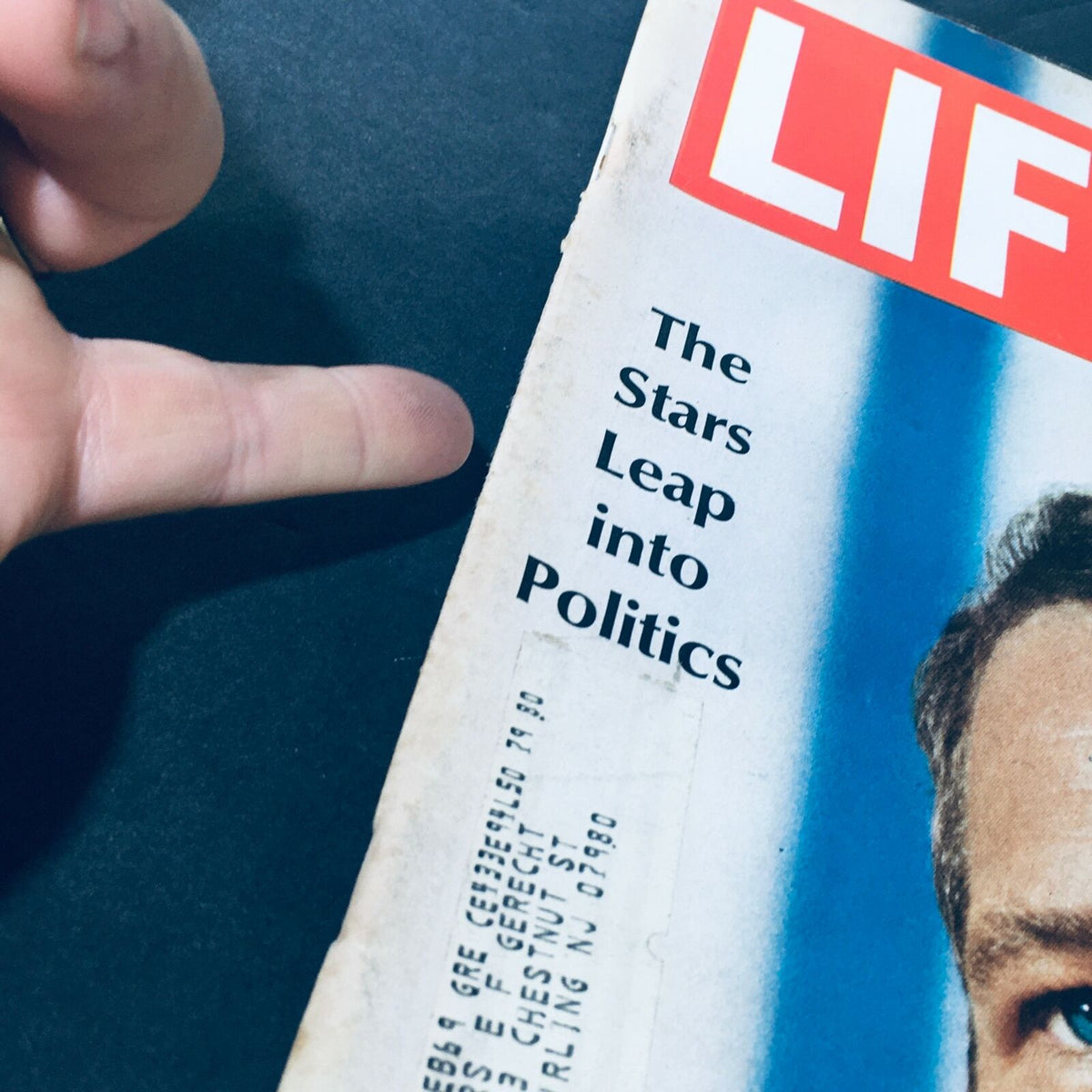 Close-up of the vintage Life Magazine cover dated May 10 1968 showcasing Paul Newman, highlighting the tagline 'The Stars Leap into Politics' on the magazine.