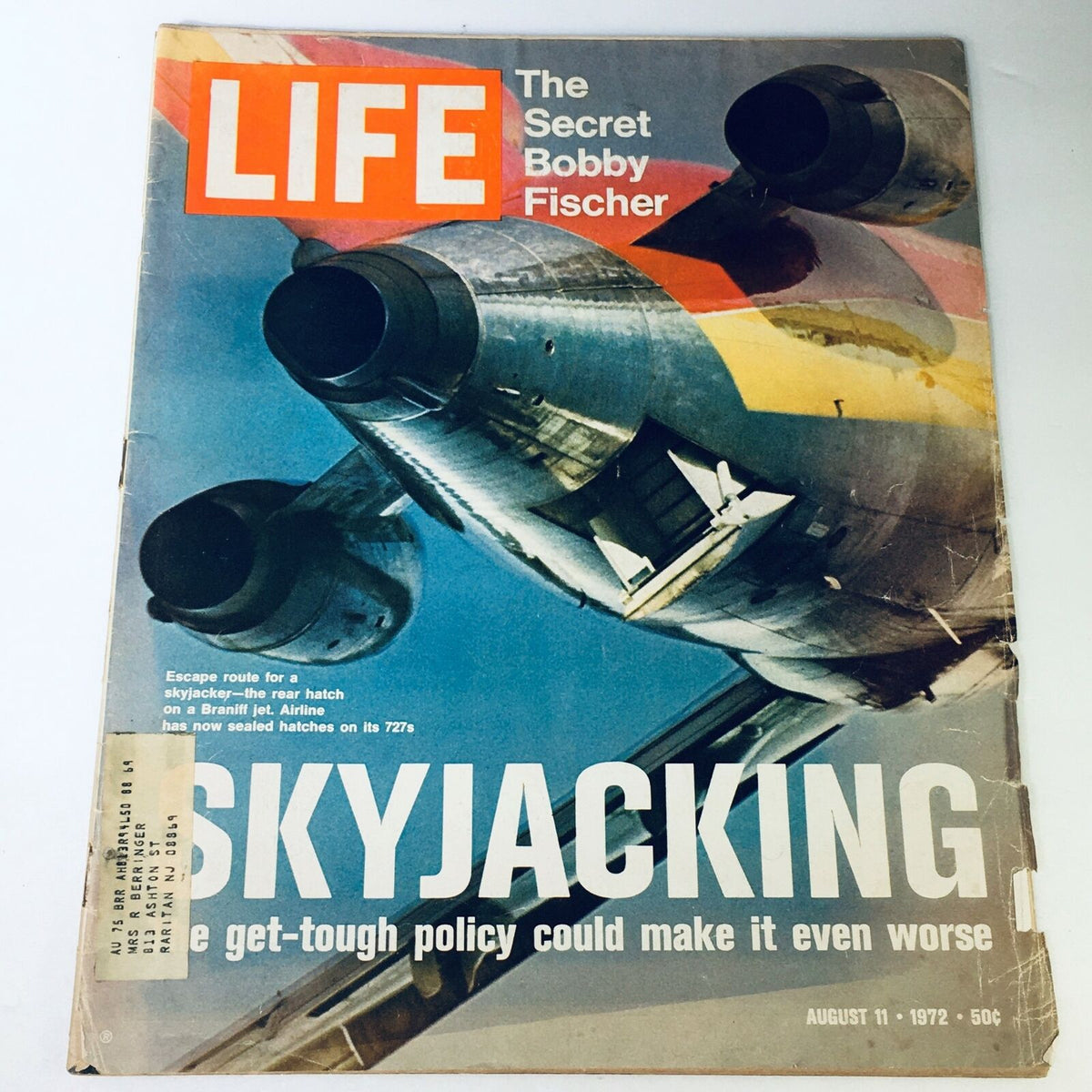 Vintage Life Magazine August 11, 1972 featuring 'The Secret Bobby Fischer' and an article on Skyjacking, showcasing an image of an airplane's rear hatch. This collectible captures a pivotal moment in history for chess and aviation.