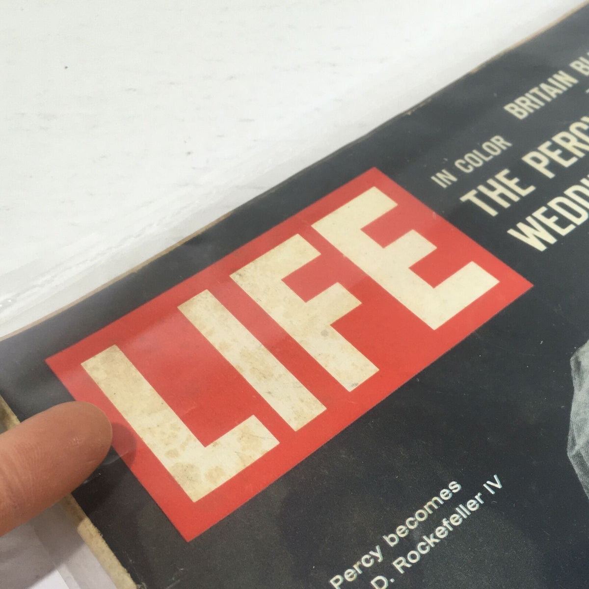 Detail of the Life Magazine cover from April 14, 1967, displaying the iconic red and white 'LIFE' title and the announcement of the Percy-Rockefeller wedding.