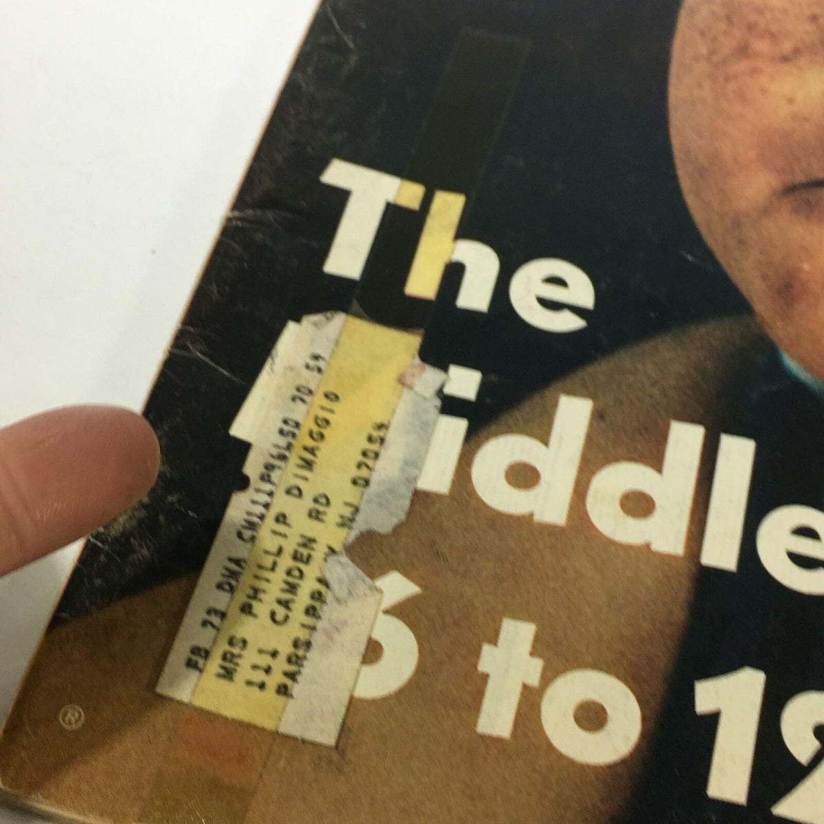 Close-up of the cover of VTG Life Magazine October 20, 1972, displaying a label with the name of a previous owner and the section title "The Middle Age Child".