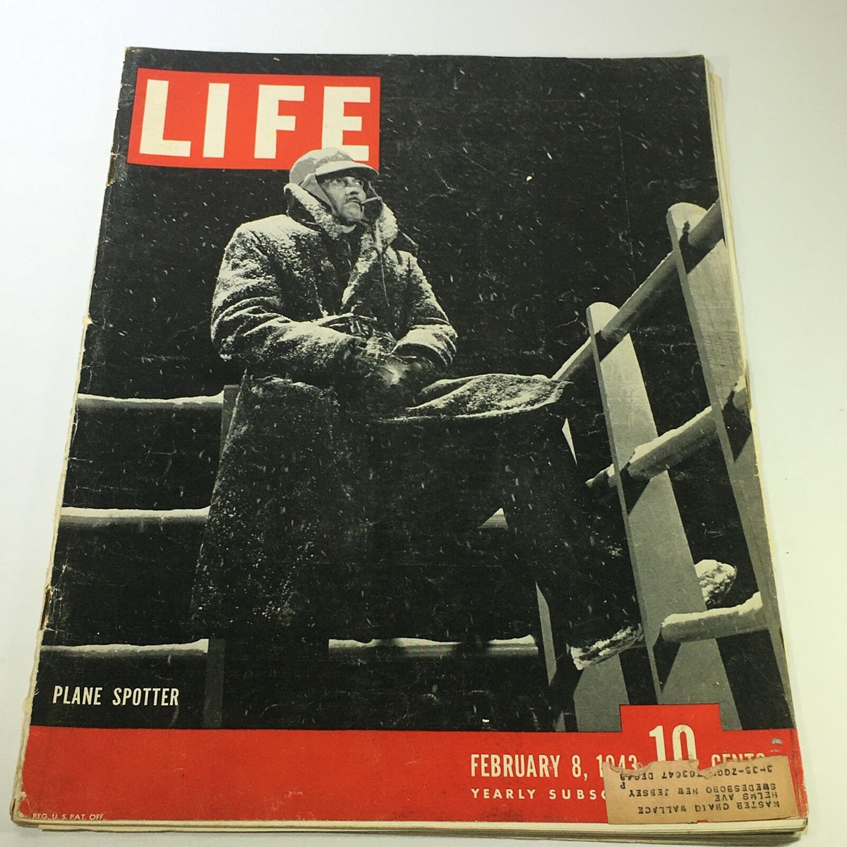 Cover of VTG Life Magazine dated February 8, 1943, featuring the title 'Plane Spotter Photographed' along with a soldier in winter attire, emphasizing World War II history.