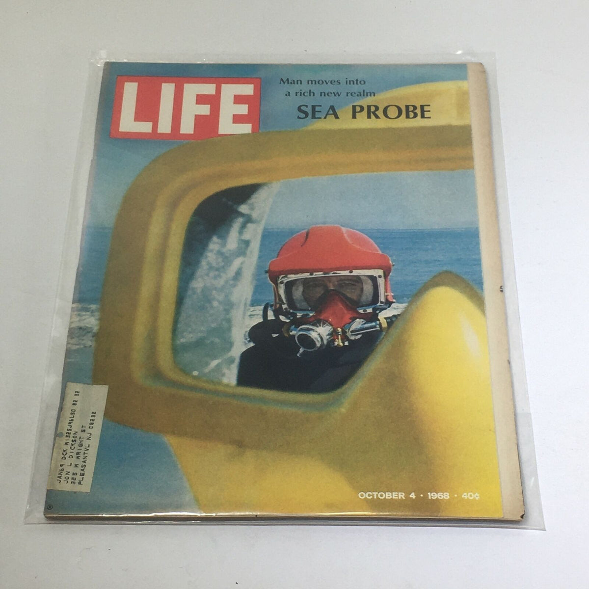 Front cover of VTG Life Magazine from October 4, 1968, featuring the headline 'Man Moves into A Rich New Realm Sea Probe' with a diver in a red helmet reflected in a yellow lens.