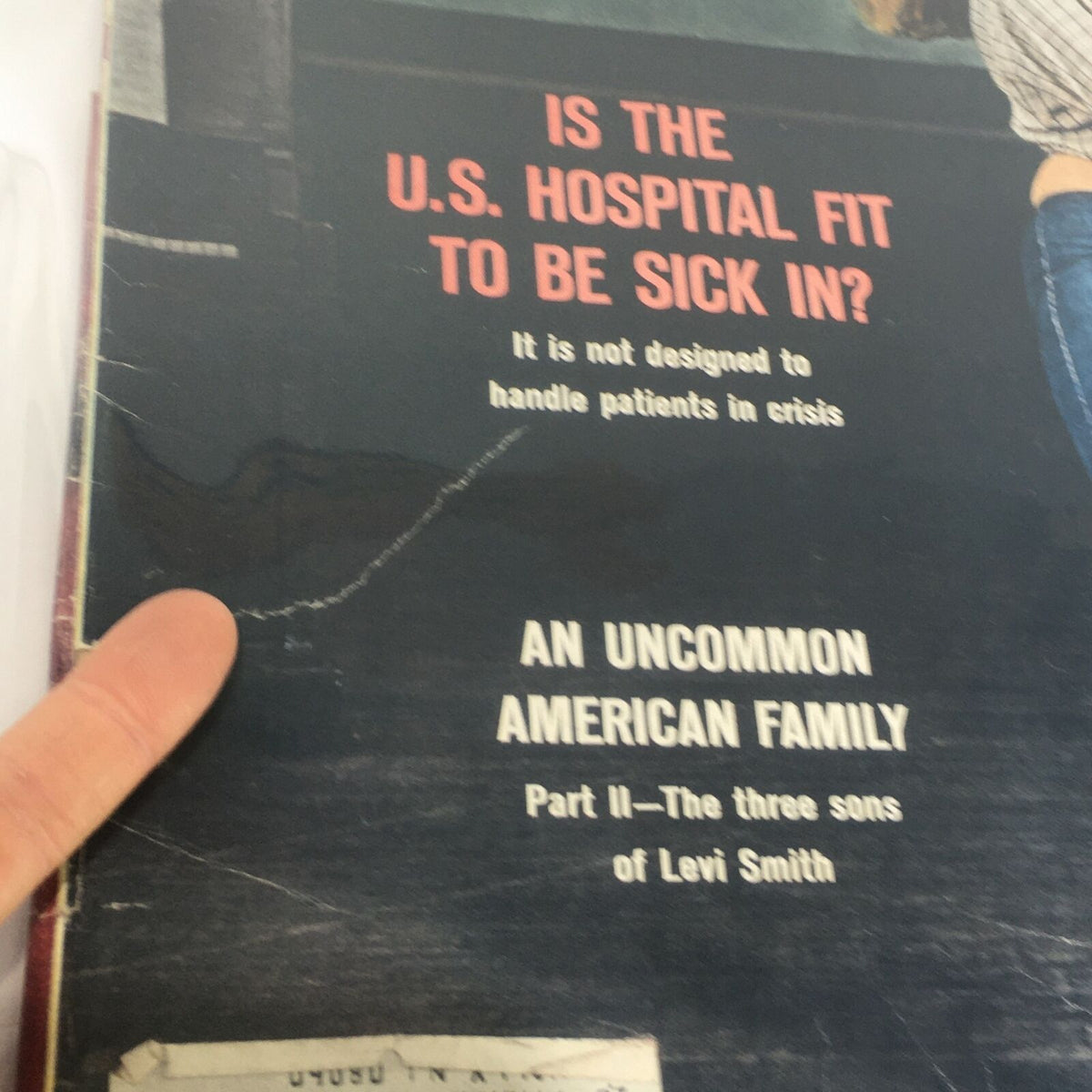 Detailed view of the cover of Life Magazine from December 2, 1966, highlighting the title 'An Uncommon American Family Part - II' and visible wear on the magazine's binding.