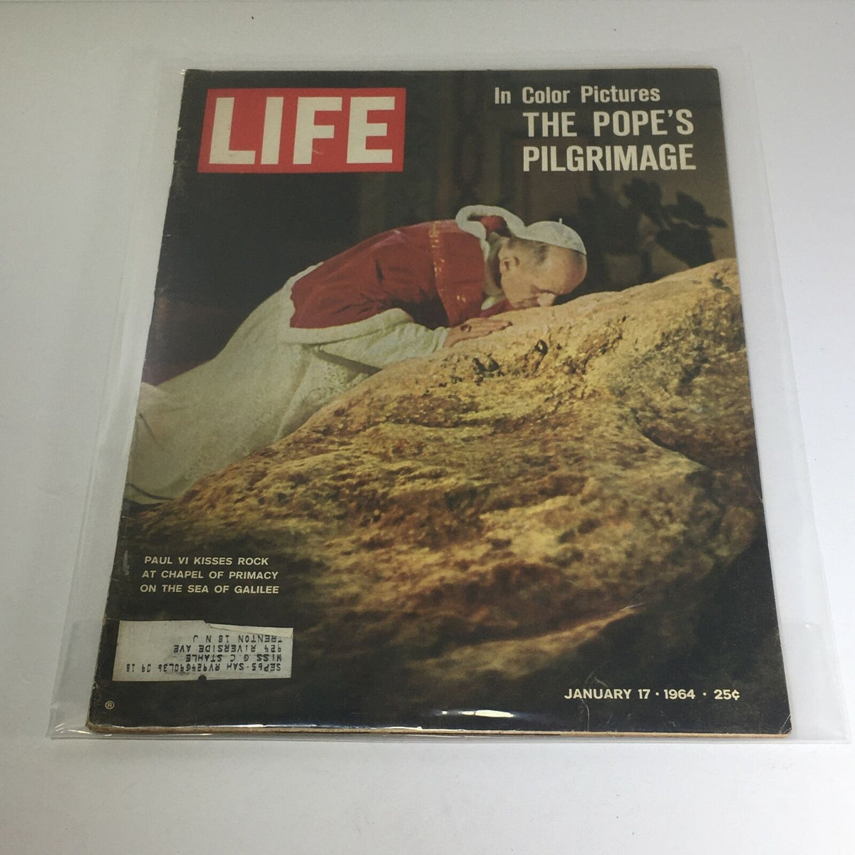 Vintage Life Magazine Cover from January 17, 1964, featuring the title 'The Pope's Pilgrimage' with an image of Pope Paul VI kissing a rock at the Chapel of Primacy on the Sea of Galilee.