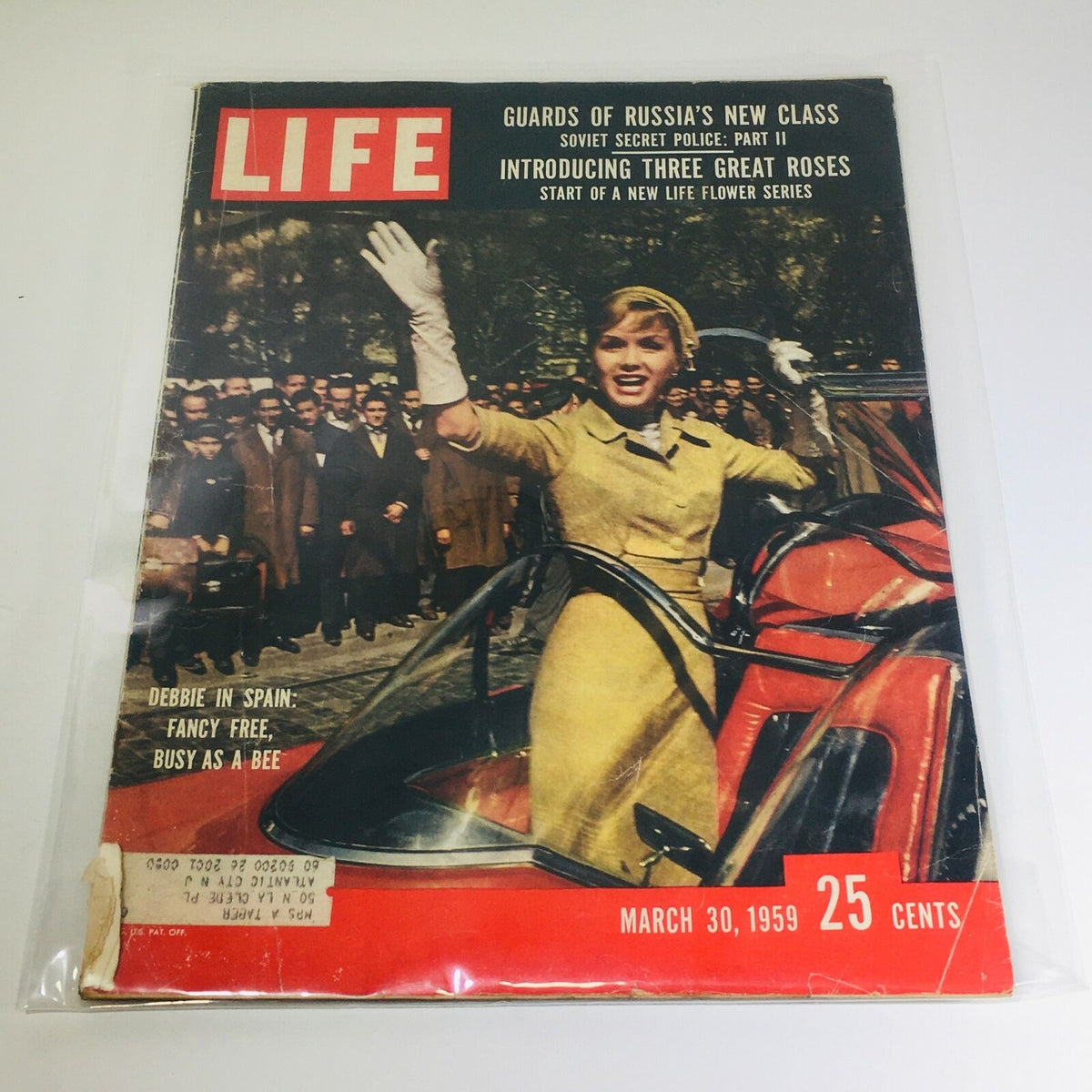 VTG Life Magazine cover from March 30, 1959 featuring an article on 'Debbie in Spain' and 'Guards of Russia', showcasing a young woman in a yellow outfit waving from a red car.