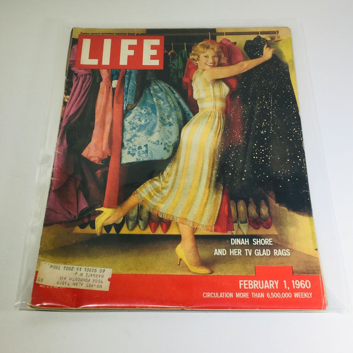 Vintage Life Magazine cover from February 1, 1960 featuring Dinah Shore posing with stylish dresses, showcasing her TV Glad Rags
