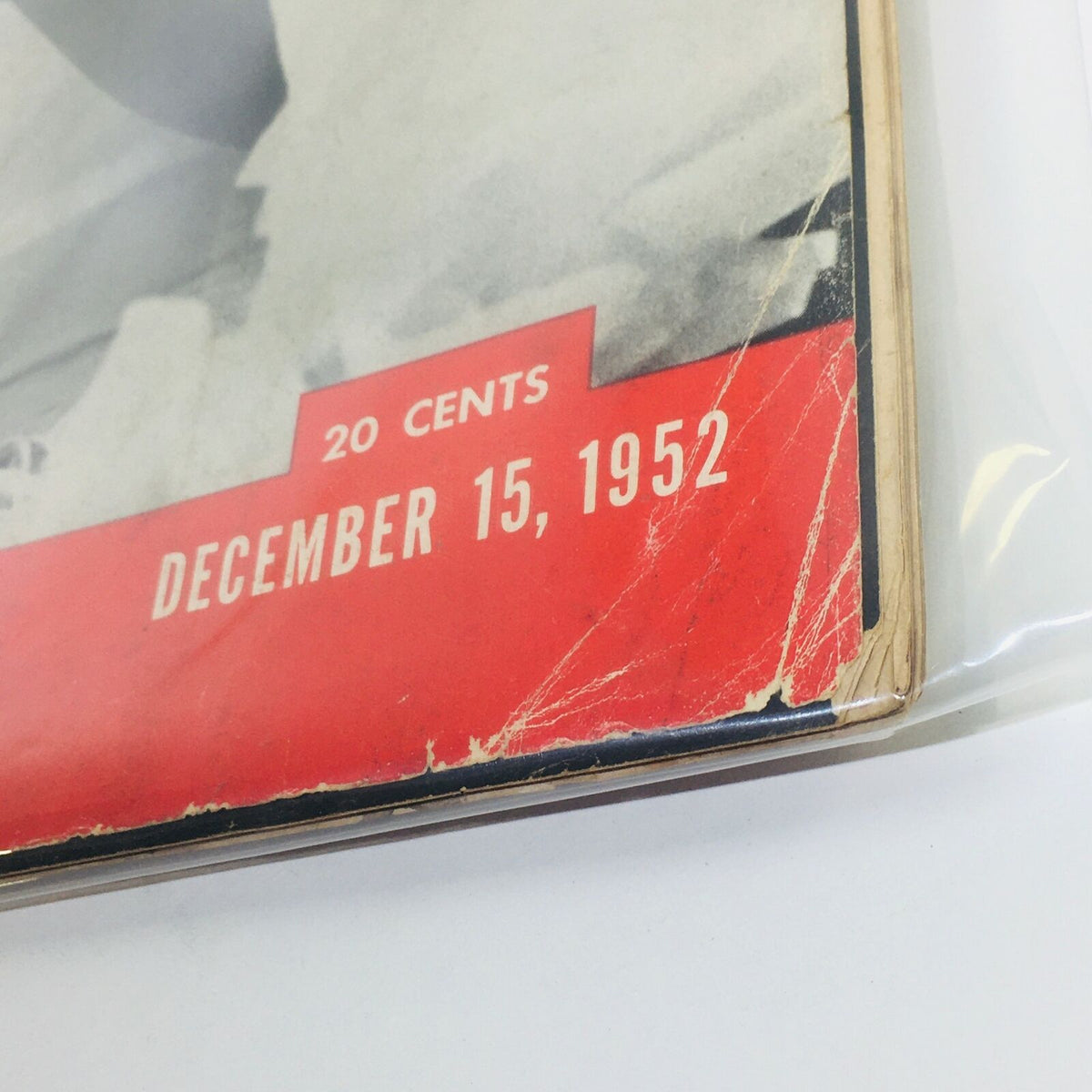 Side view of the VTG Life Magazine dated December 15, 1952, highlighting its vintage condition with visible wear, including the publication date and collectible details.