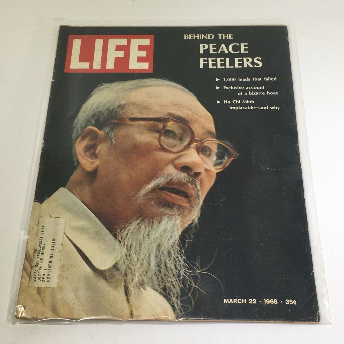Vintage Life Magazine cover from March 22, 1968 featuring Ho Chi Minh with the headline 'Implacable - And Why?'. Includes details of the magazine's content and authenticity with original address label.