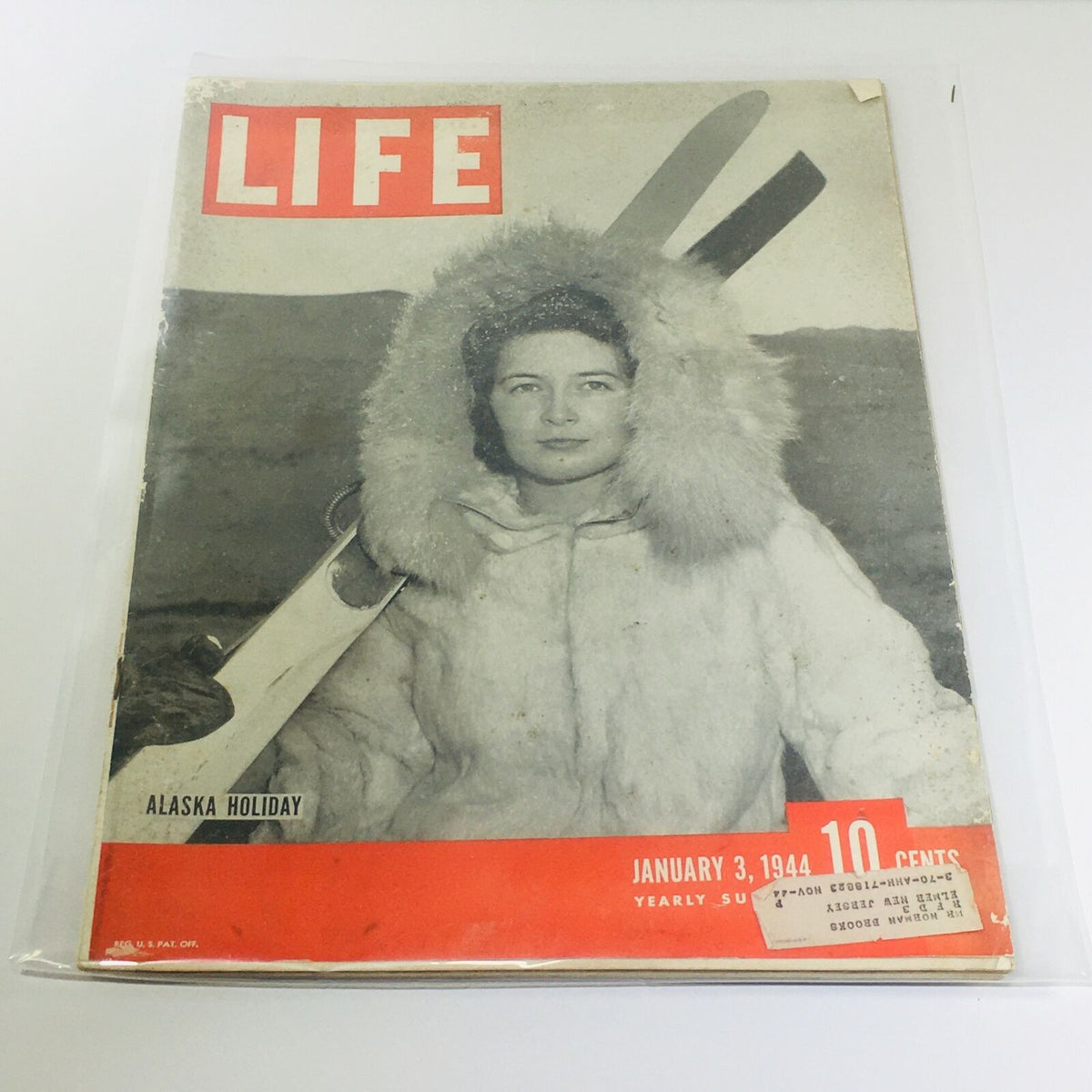 VTG Life Magazines: January 3 1944 - Alaska Holiday / New Guinea Rescue cover featuring a woman in a fur-lined coat with skis, showcasing the magazine's vintage appeal and historical significance.