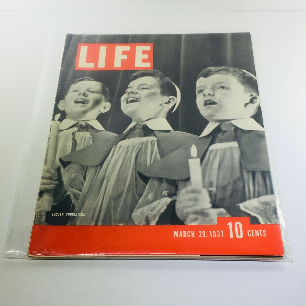 Vintage Life Magazine cover featuring Easter Choristers, March 29, 1937, showcasing three choir boys singing with candles, vibrant red and black design, collectible item.