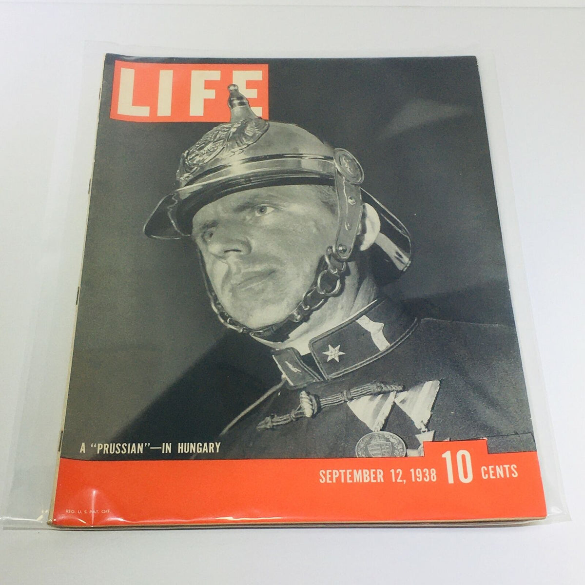 Vintage Life Magazine Cover for 'A Prussian in Hungary' dated September 12, 1938, featuring a soldier in uniform and the iconic LIFE magazine logo.