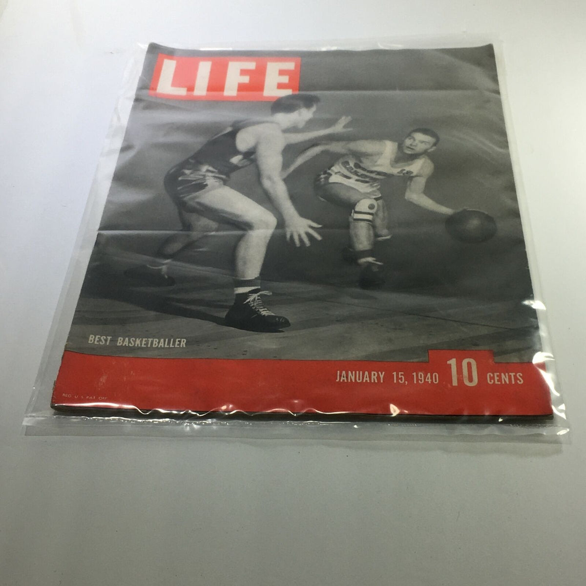 Vintage Life Magazine cover from January 15, 1940, featuring the title 'Best Basketballer' with a striking black and white image of basketball players in action. Ideal for collectors and sports enthusiasts.