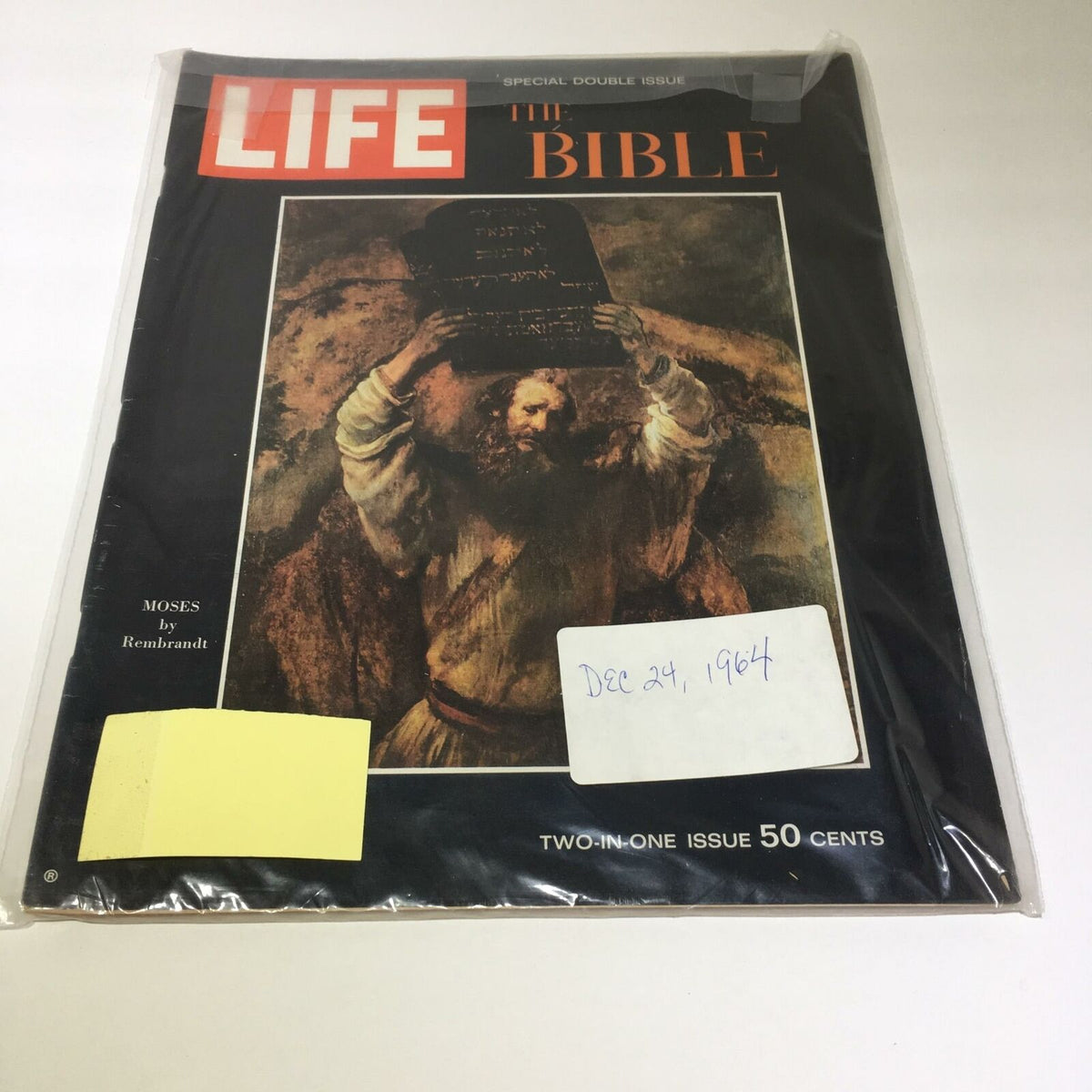 VTG Life Magazine cover from December 24, 1964 featuring 'Moses by Rembrandt' artwork, showcasing the intersection of art and biblical narratives. The magazine highlights historical content and comes wrapped in protective plastic.