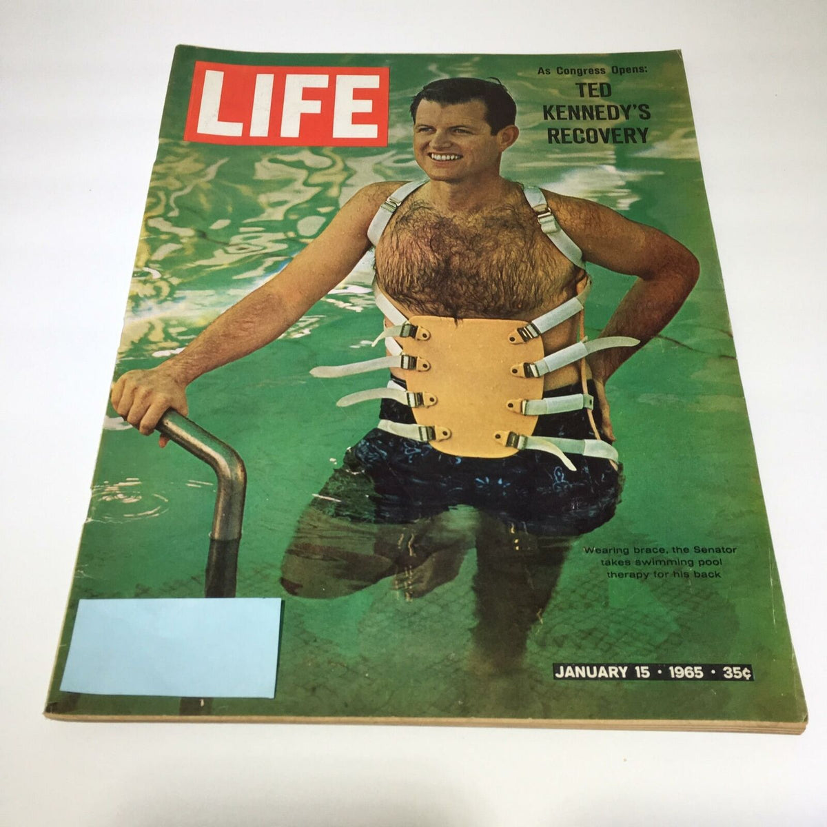 Cover of VTG Life Magazine from November 15, 1965, featuring Ted Kennedy taking swimming pool therapy, showcasing him in a therapeutic brace while standing in water.