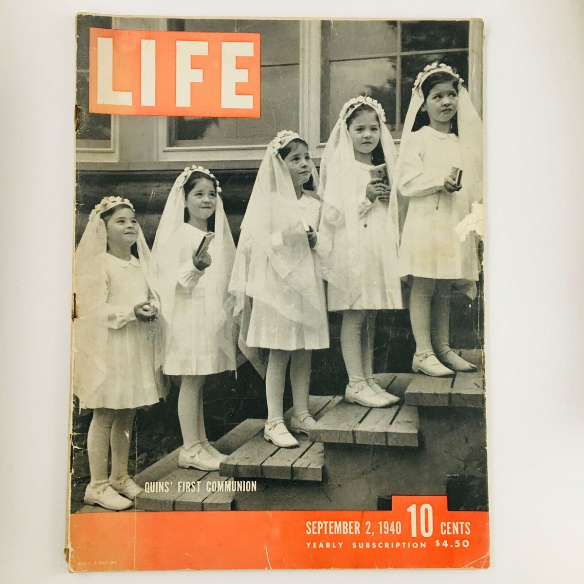 Front cover of VTG Life Magazine September 2, 1940 featuring The Quintuplet's First Communion, showcasing five girls in white dresses and veils standing on wooden steps.