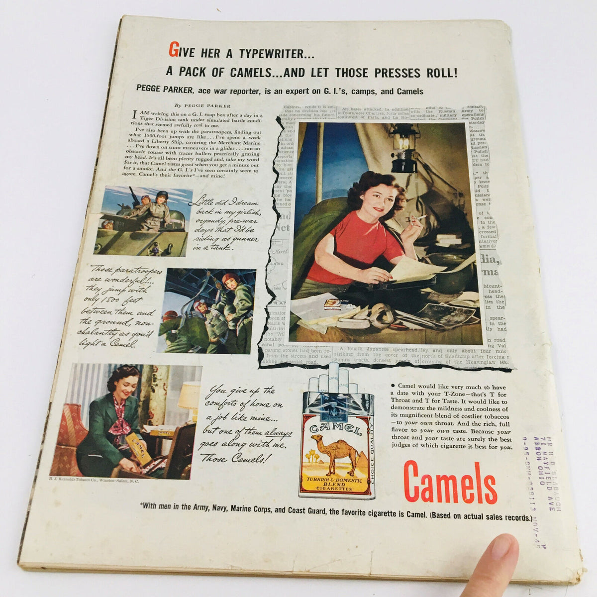 Back cover of VTG Life Magazine October 23 1944, featuring an advertisement for Camel cigarettes, with a woman working and images of soldiers in various settings.