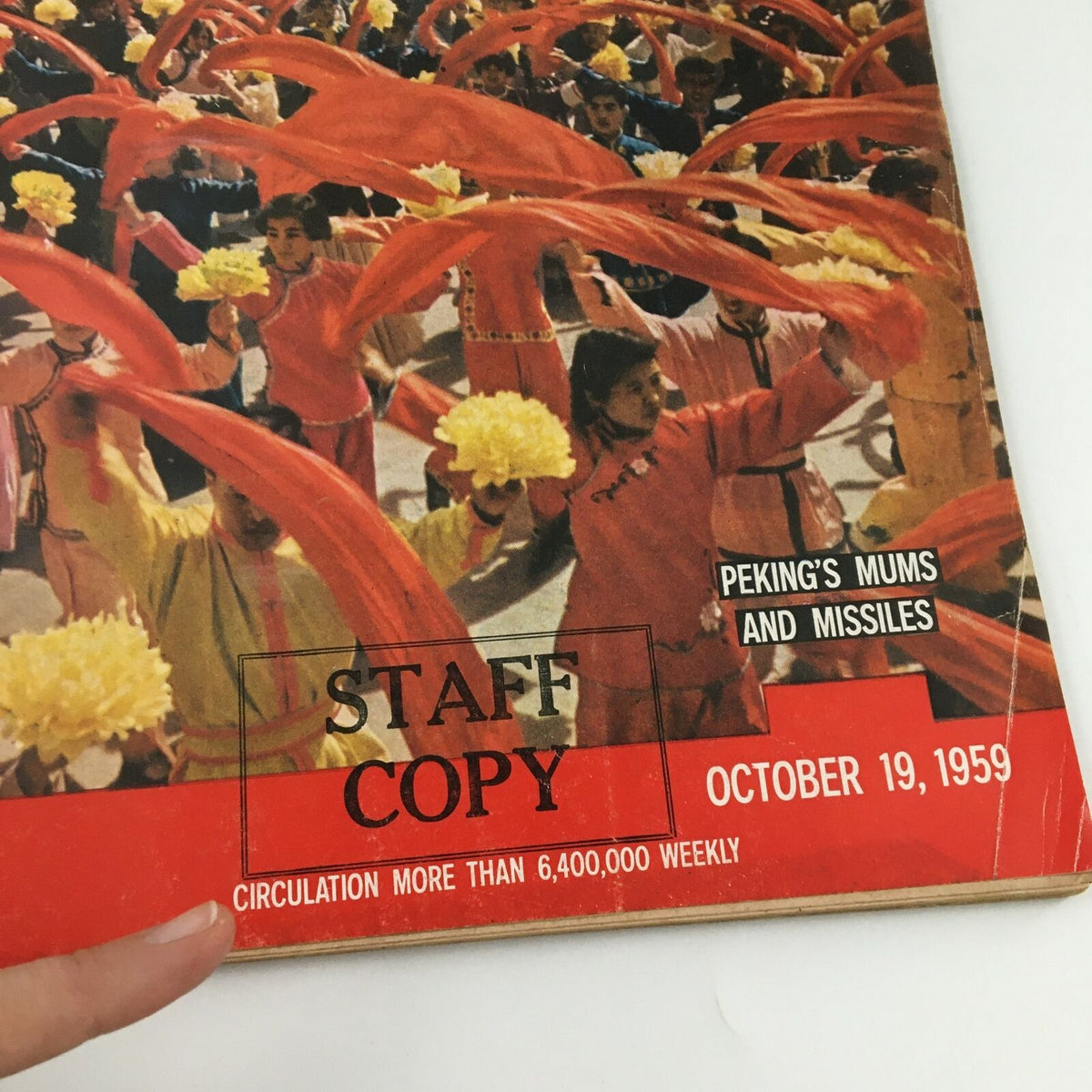 Cover of VTG Life Magazine from October 19, 1959, showcasing the title 'Peking's Mums and Missiles' with vibrant dancers holding flowers and waving red ribbons, featuring a 'Staff Copy' stamp.