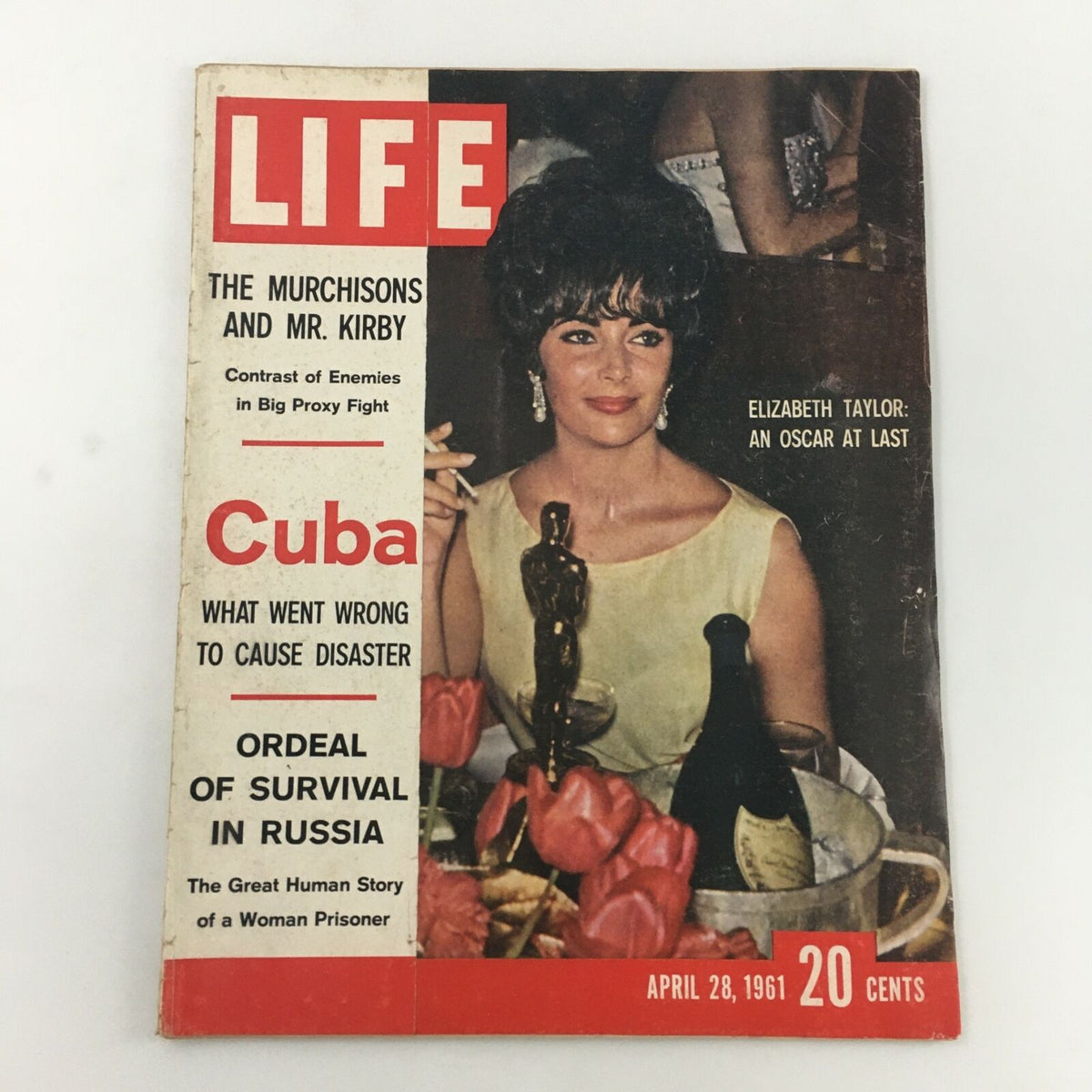 VTG Life Magazine April 28 1961 cover featuring Elizabeth Taylor holding an Oscar, showcasing classic Hollywood glamour and culture.