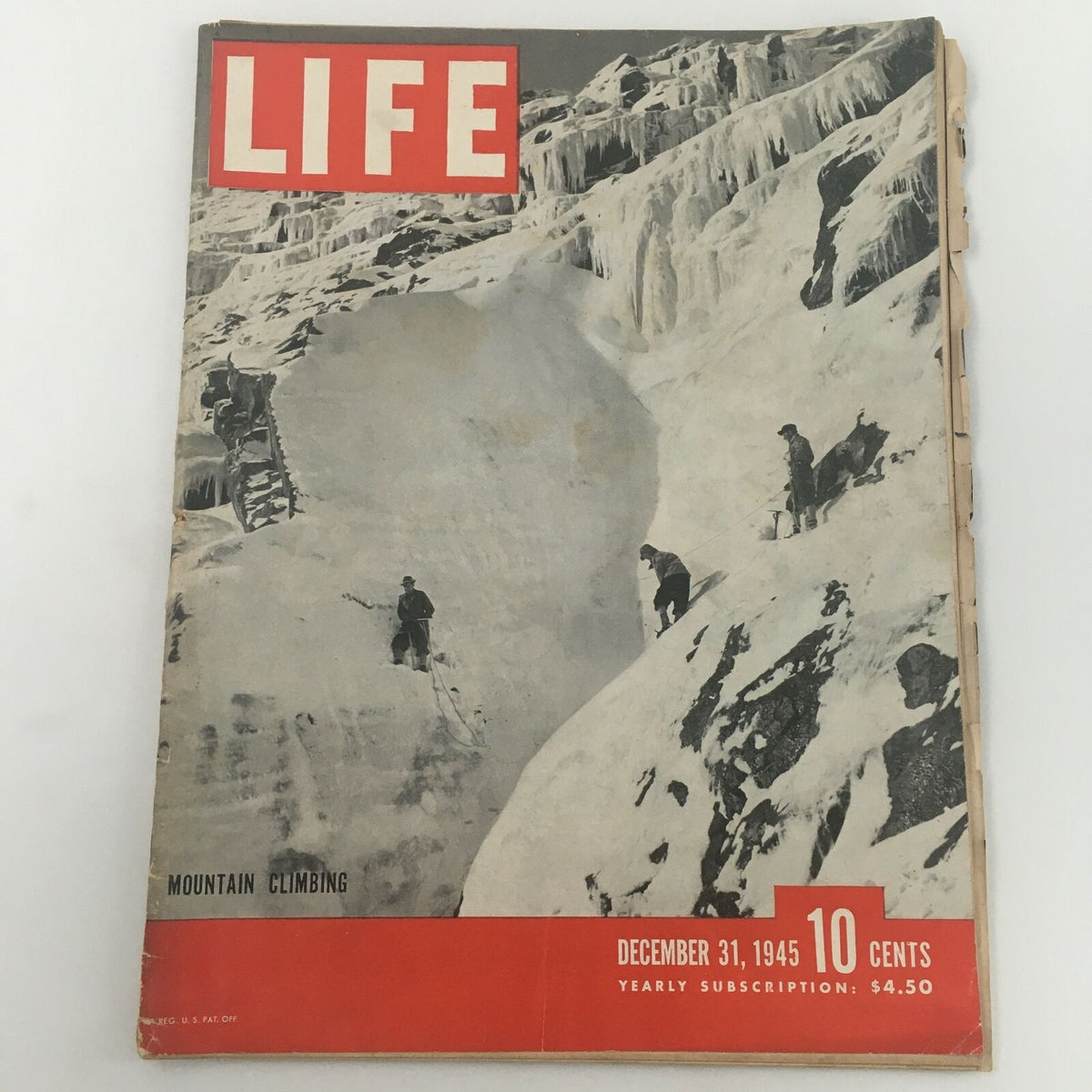 Cover page of VTG Life Magazine December 31, 1945 featuring mountain climbing, showcasing climbers navigating an icy terrain.