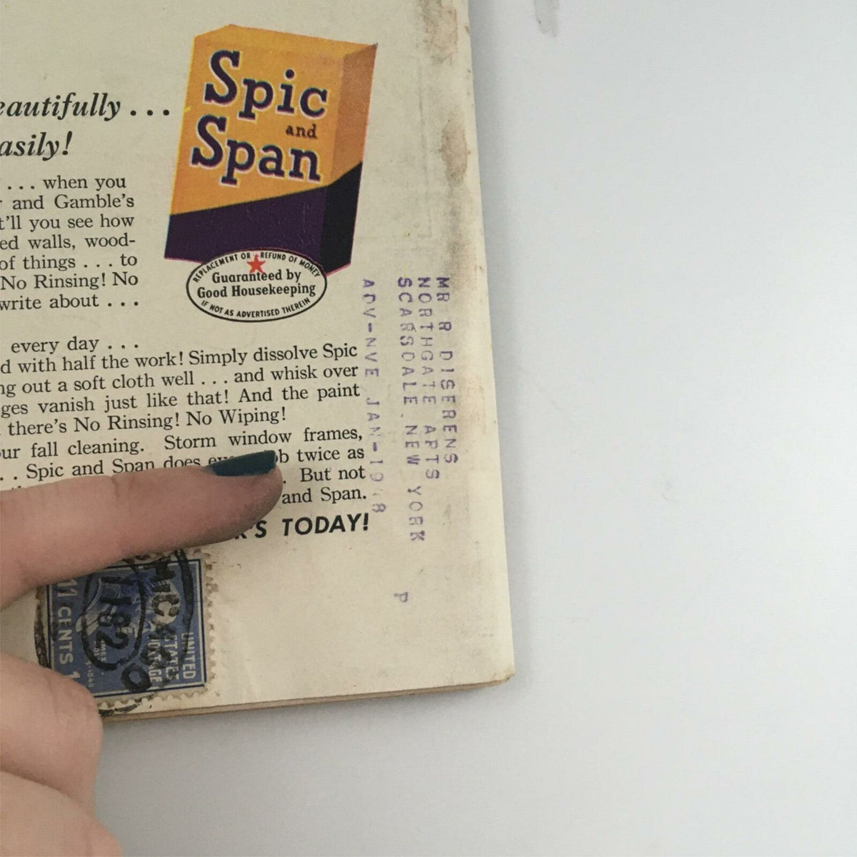 Close-up of the Spic and Span advertisement on the back cover of a 1947 vintage magazine, discussing product features, with a visible mailing label.