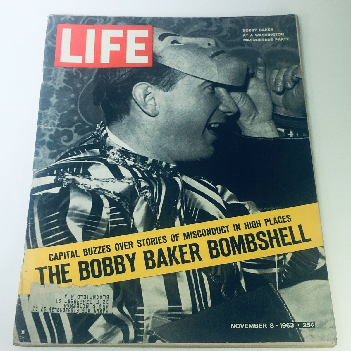 Cover of the November 8, 1963 issue of Life Magazine featuring Bobby Baker at a Washington Masquerade Party. The magazine highlights stories of misconduct in high places with a striking visual design, showcasing historical photography and bold headlines.