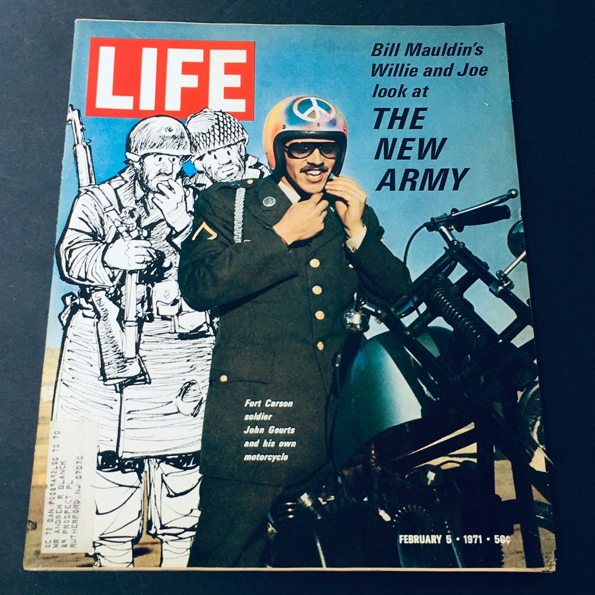 Cover of the VTG Life Magazine February 5 1971 featuring Bill Mauldin's Willie and Joe at The New Army, showcasing a soldier in uniform and motorcycle against a vibrant background.