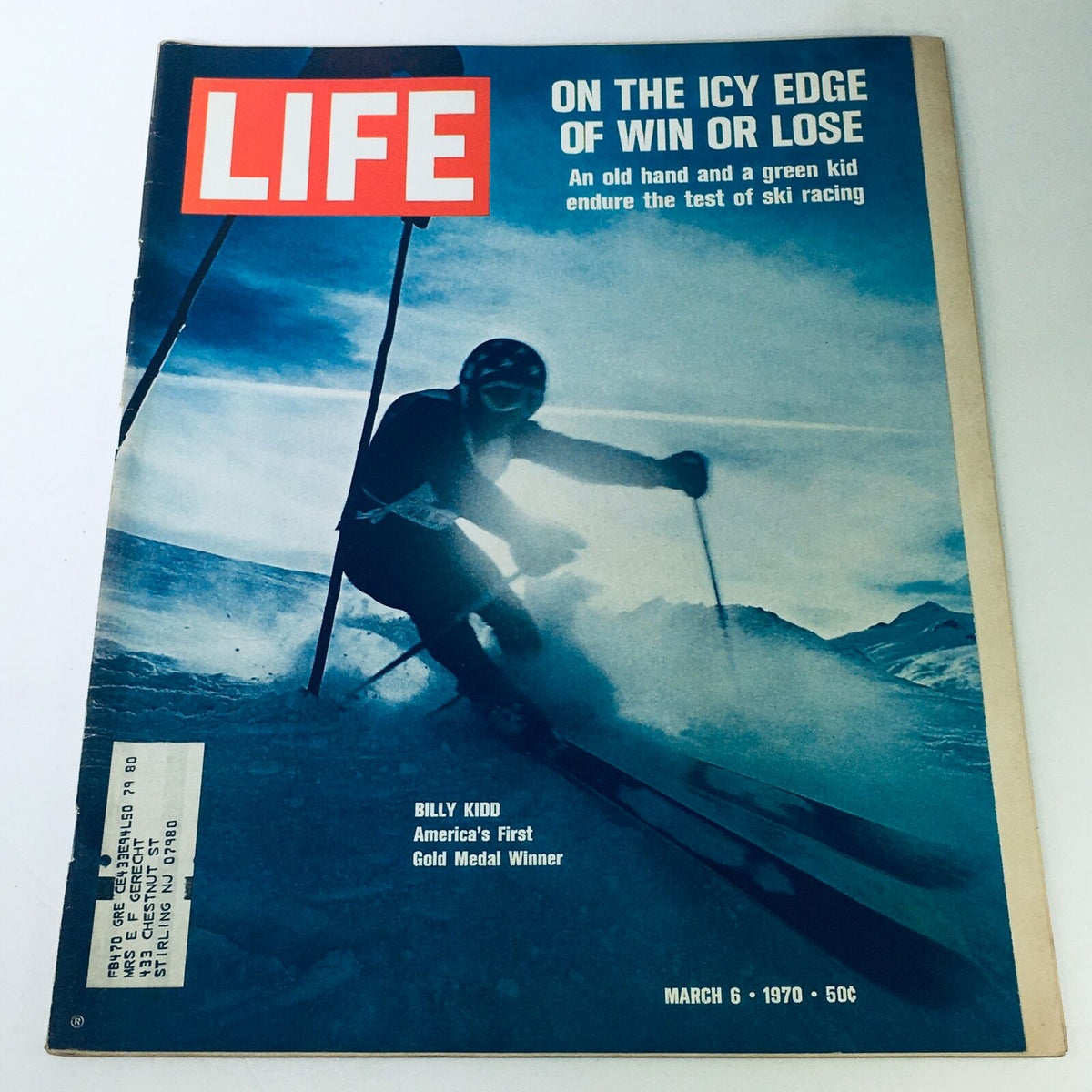 Cover of VTG Life Magazine from March 6, 1970, featuring Billy Kidd, America's First Gold Medal Winner in skiing, showcasing a dynamic skiing scene with snowy mountains in the background.