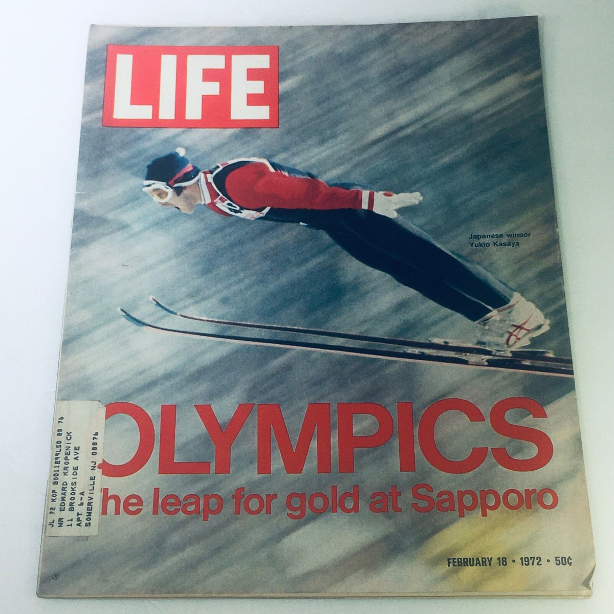 Cover of VTG Life Magazine February 18 1972 featuring Japanese winner Yukio Kasaya in mid-air during a ski jump at the Olympics.