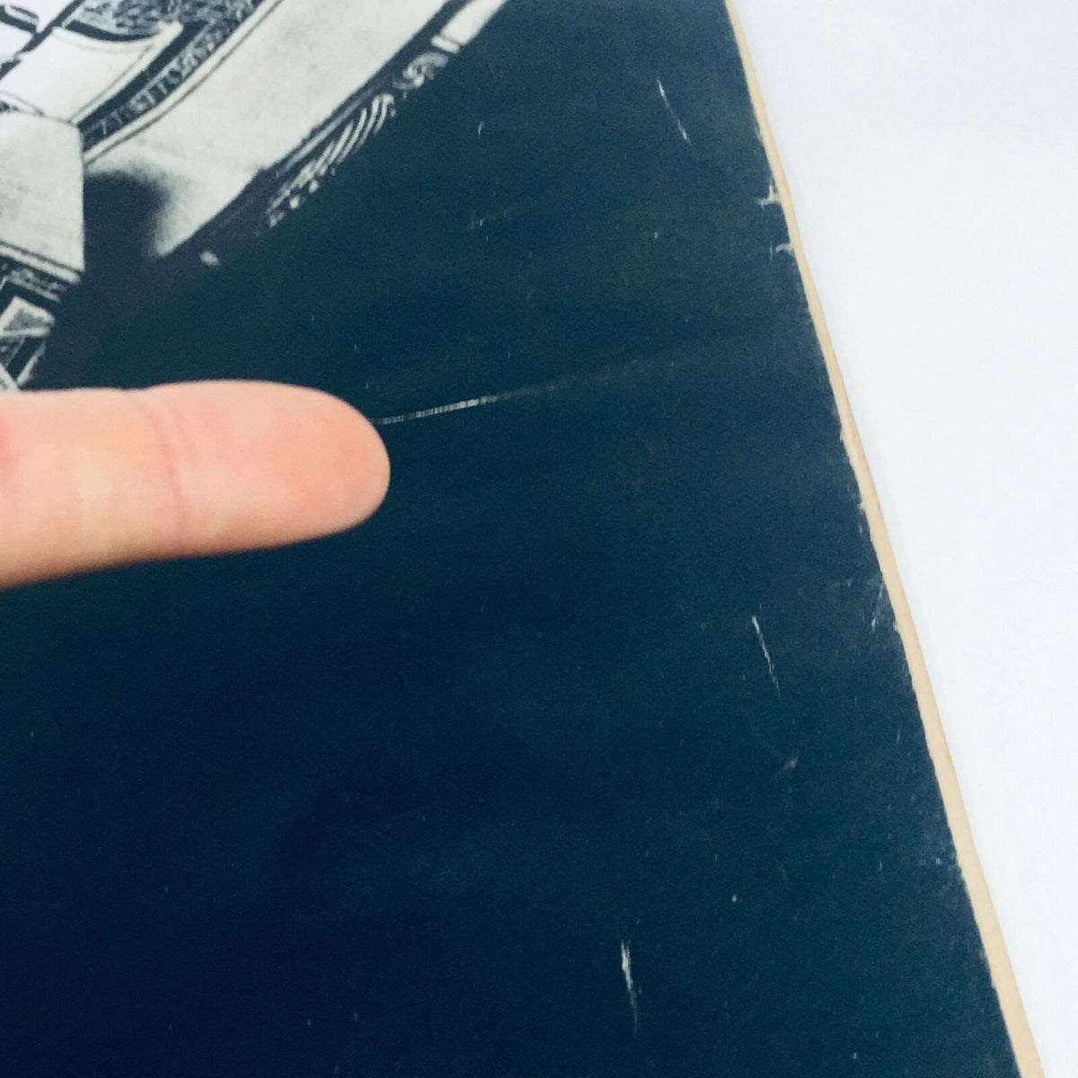 Close-up detail of vintage Life Magazine cover from August 15, 1969, showing a finger pointing to imperfections on the black background, part of a collection about experiments in marriage from Denmark and Sweden.