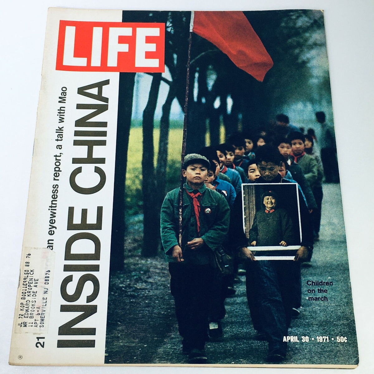 Cover of VTG Life Magazine April 30 1971 featuring the title 'Children On The March Inside China' with children marching and a flag in the background, showcasing a historical moment.