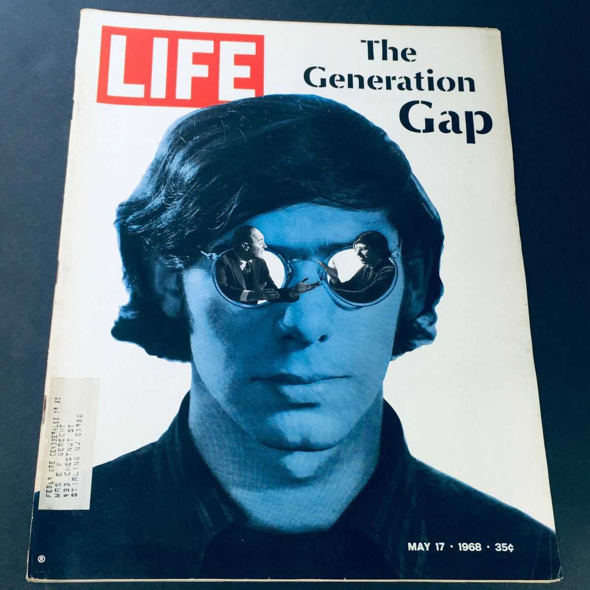 Cover of VTG Life Magazine May 17 1968 featuring the theme 'The Generation Gap', showcasing a youthful figure with reflective sunglasses containing images of conversations.