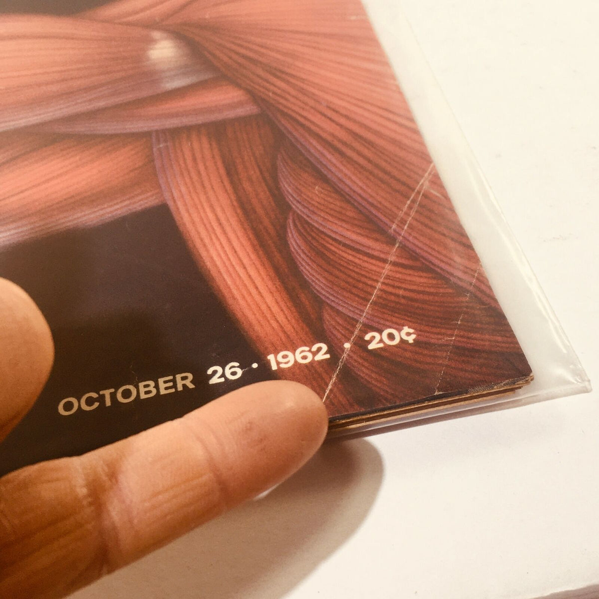 Close-up detail of the VTG Life Magazine cover from October 26, 1962, highlighting the date and price, showcasing the vintage publication's theme of "The Human Body."