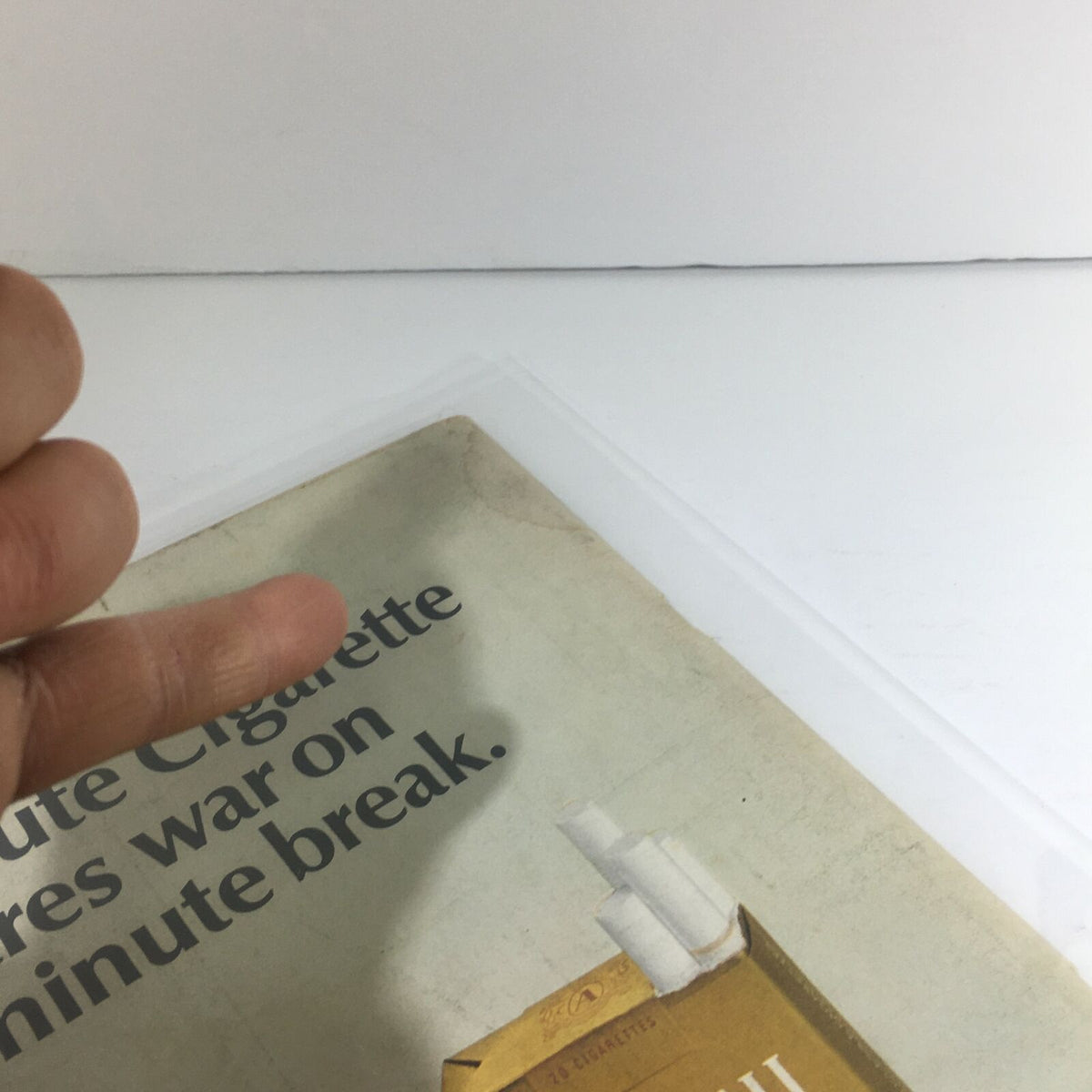 Close-up view of the cover of the VTG Life Magazine from November 24, 1967, showcasing a vintage cigarette advertisement, highlighting its worn edges, indicative of its age and historical significance.