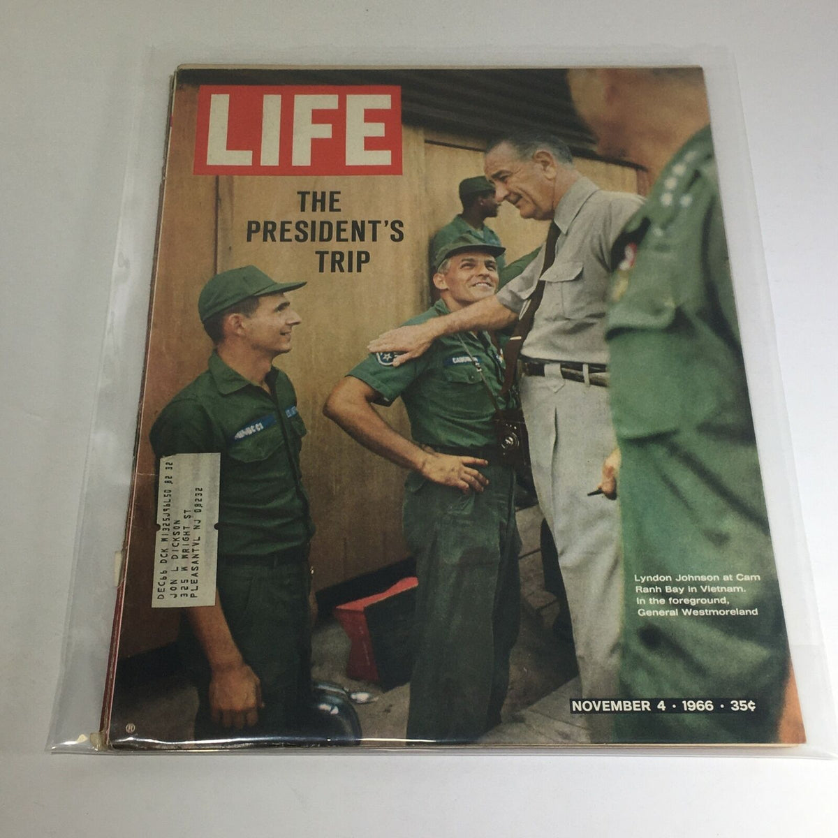 VTG Life Magazine: November 4 1966 cover featuring President Lyndon Johnson at Ranh Bay, Vietnam, with military personnel.