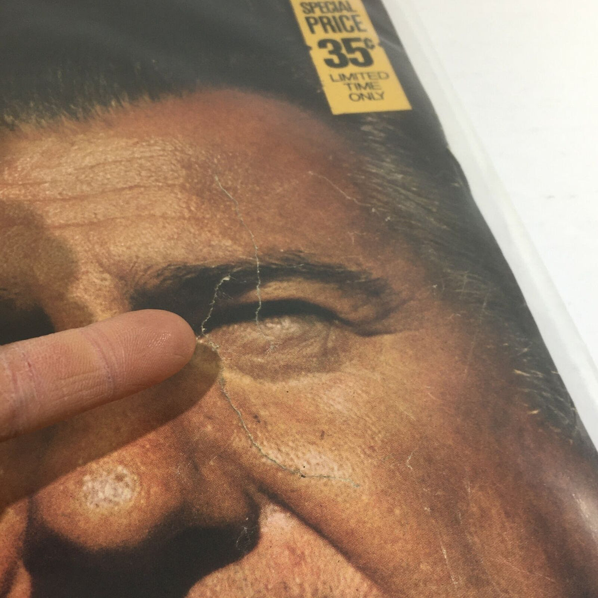 Close-up view of the cover damage on the VTG Life Magazine from October 16 1970, highlighting a crack above Agnew's eye. This edition features critical insights into the era's political climate.